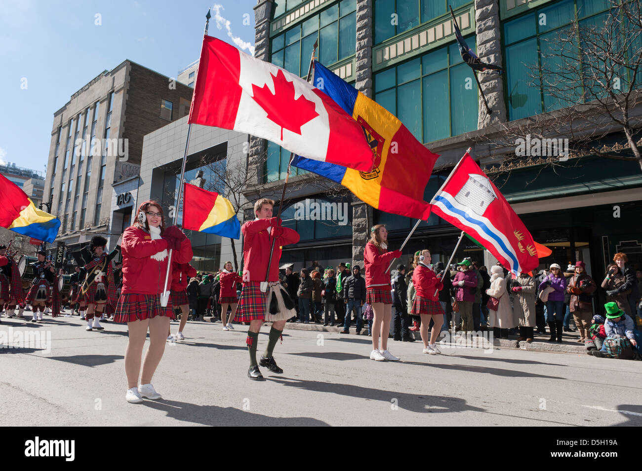 Flag bearers parading during the Saint Patrick's day parade in Montreal, province of Quebec, Canada. Stock Photo