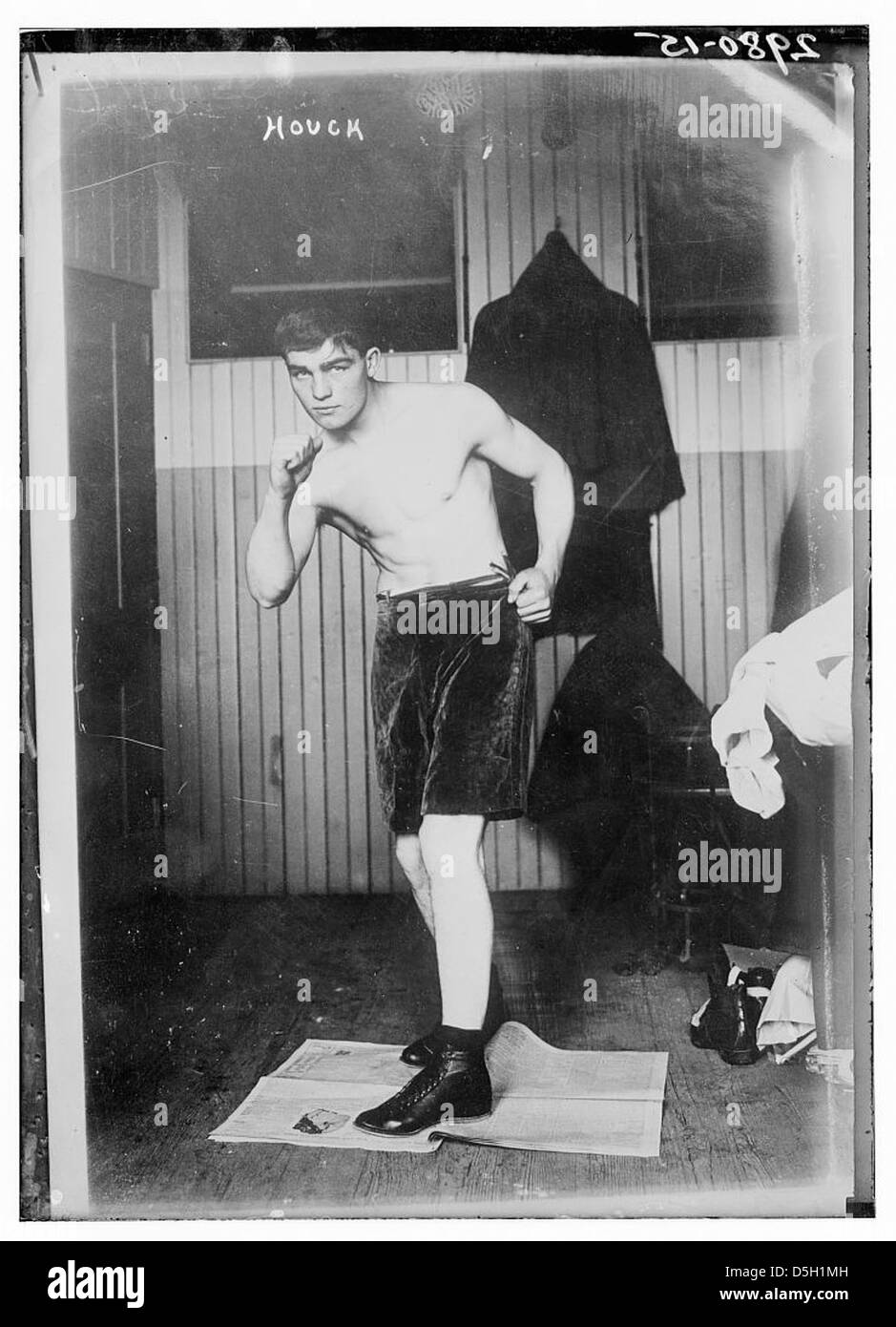 A portrait of a boxer named Houck, taken in 1915. The image showcases ...