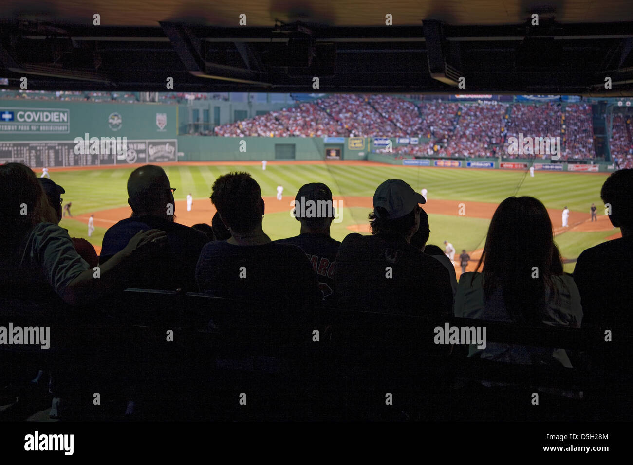 Silhouette crowd watches baseball game historic Fenway Park Boston Red Sox Boston Ma. USA May 20 2010 Red Sox versus Minnesota Stock Photo