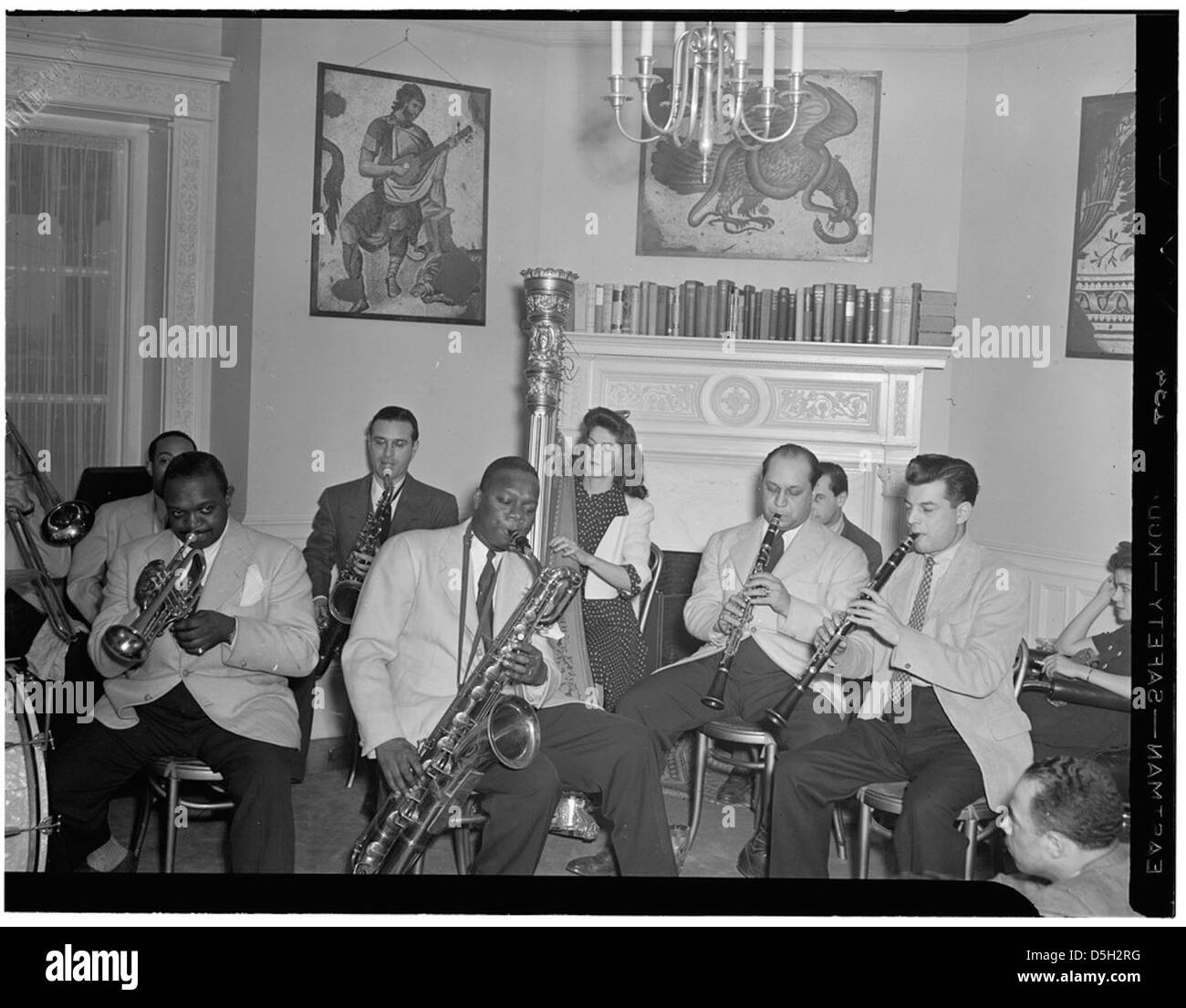 This portrait features notable jazz musicians Johnny Hodges, Rex Stewart, Adele Girard, Harry Carney, Barney Bigard, and Joe Marsala at the Turkish Embassy in Washington, D.C., captured in the early 1930s. Stock Photo