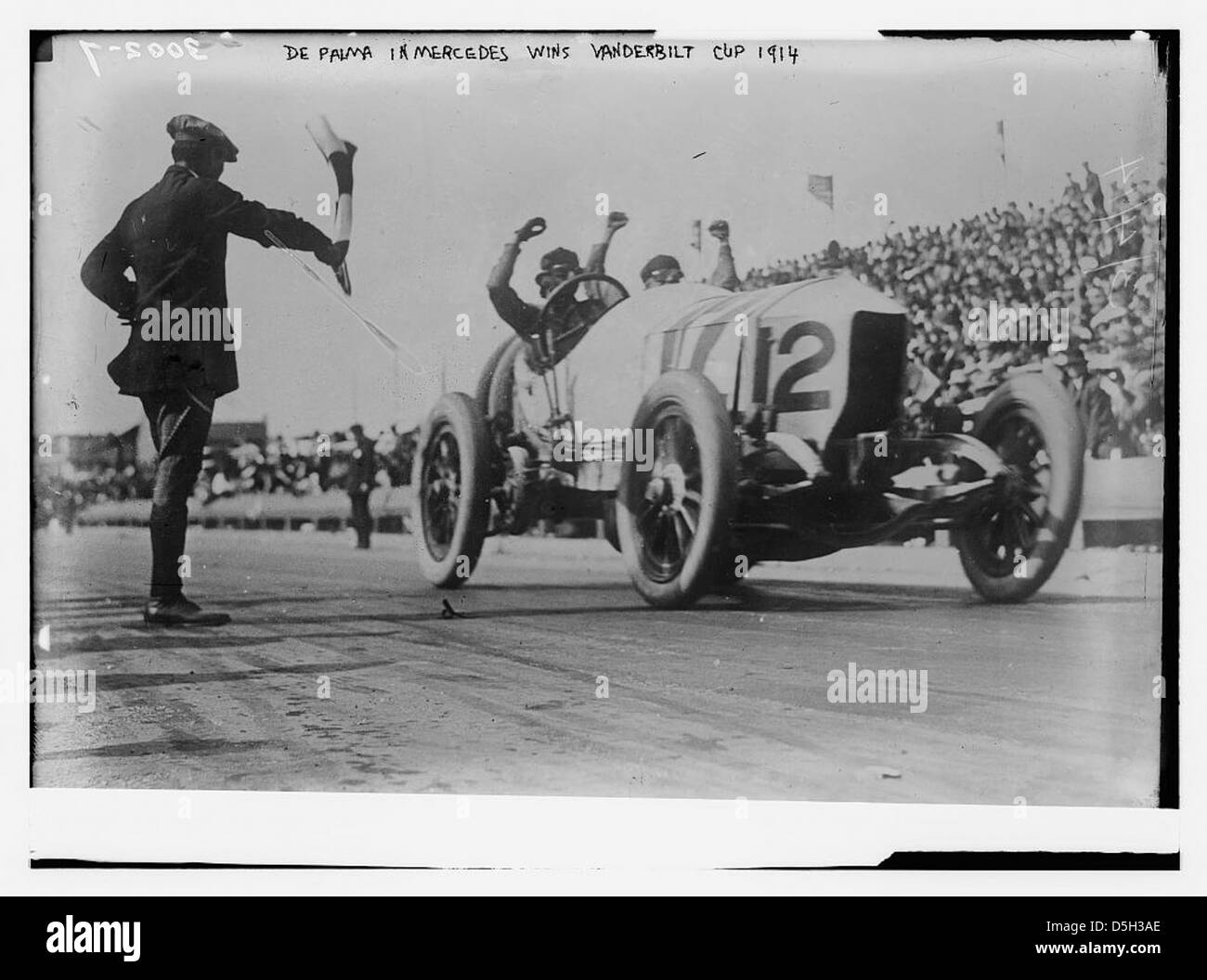Ralph De Palma drives his Mercedes to victory in the 1914 Vanderbilt Cup Race in Santa Monica, California, marking a significant event in early auto racing history. Stock Photo