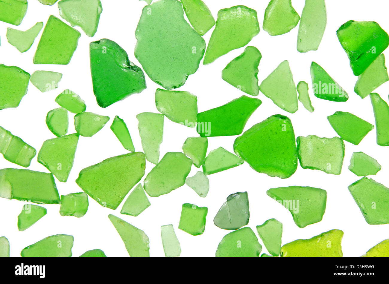 Detail of pile of green sea glass on light table Stock Photo