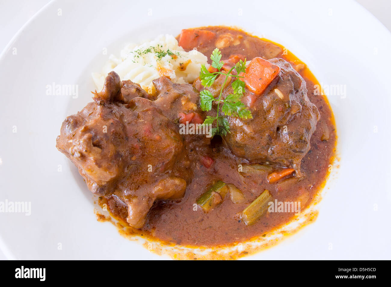 Ox Tail Beef Stew with Mashed Potatoes Closeup Stock Photo