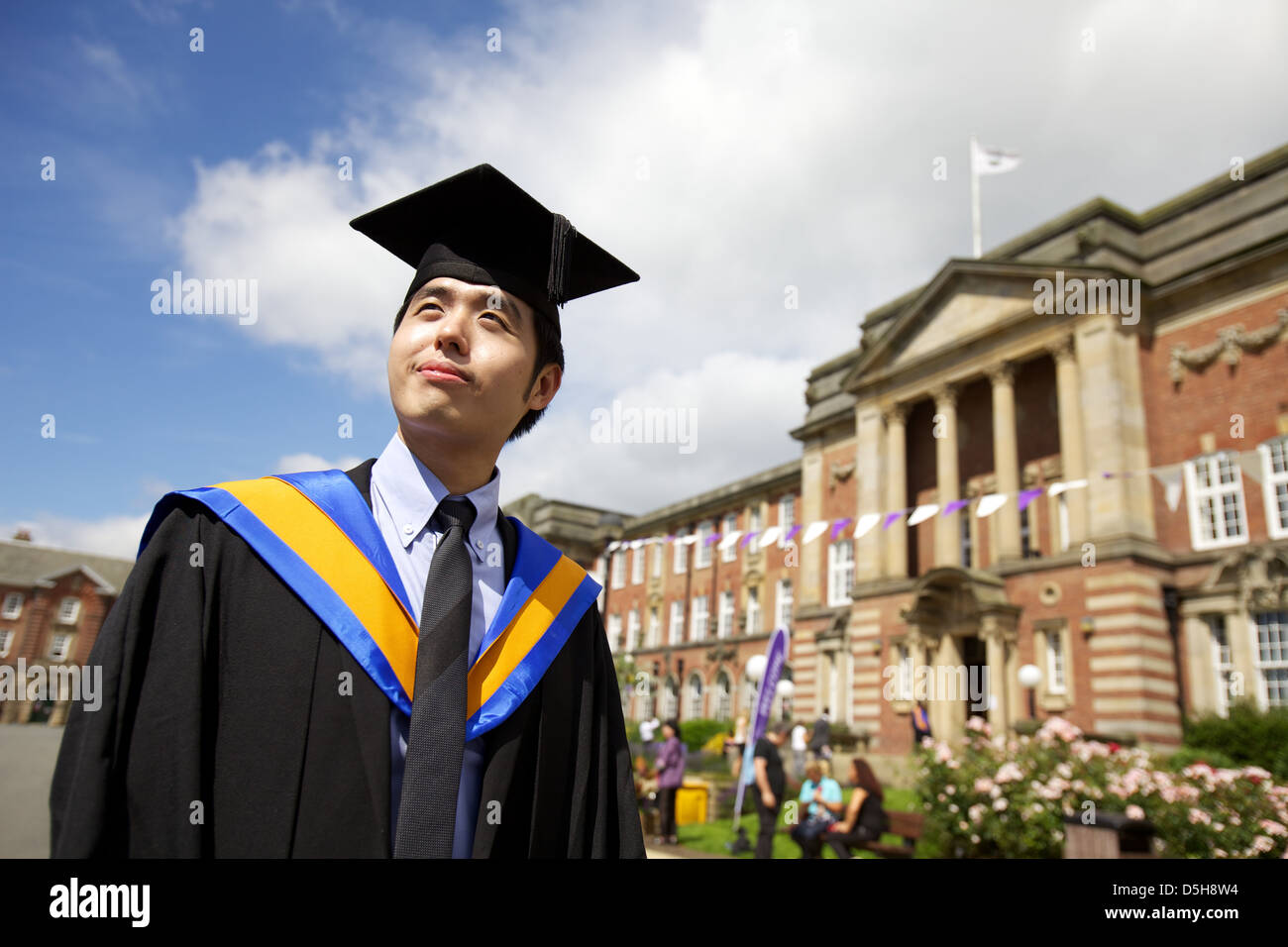 Portrait of young asian man after graduation ceremony hi-res stock ...