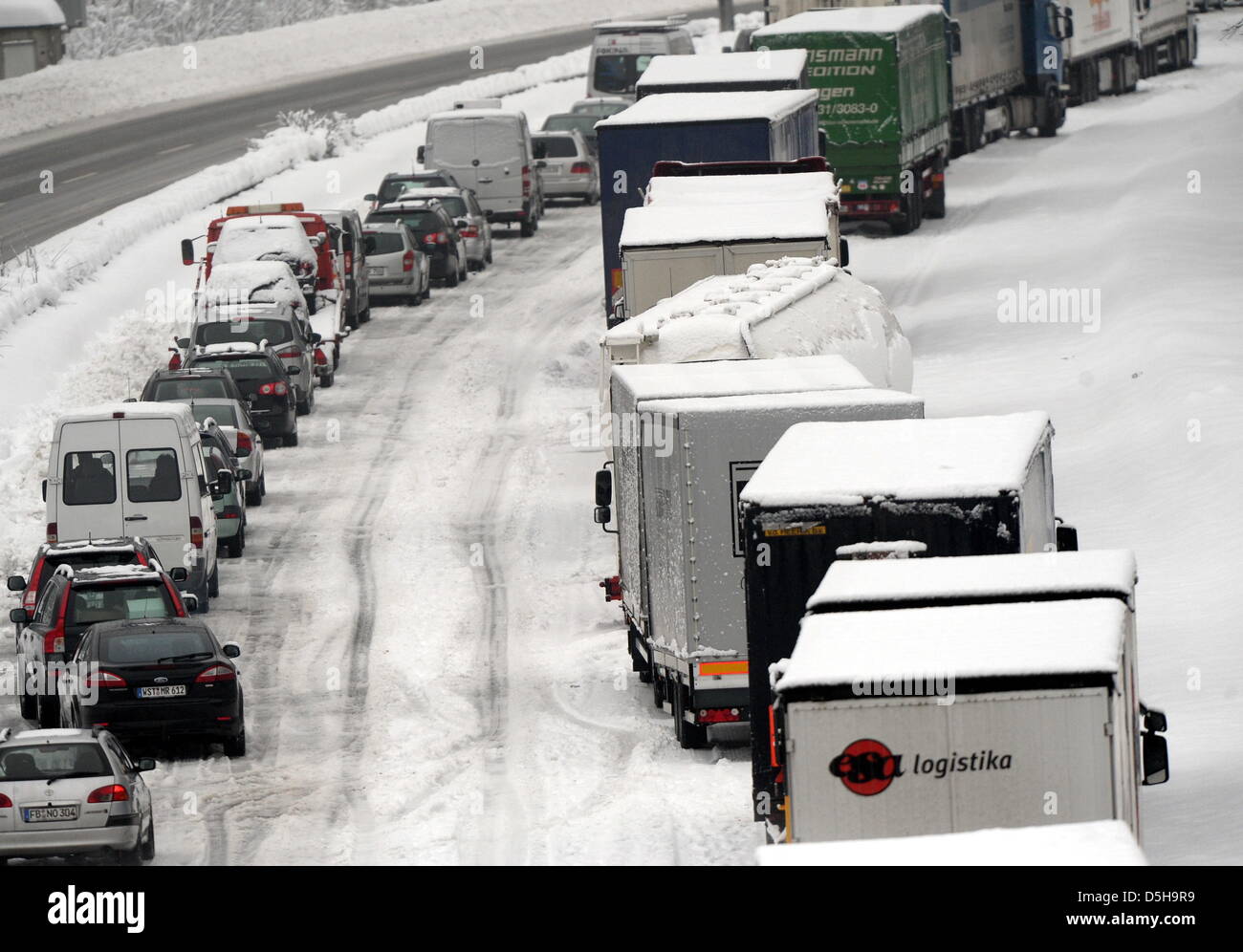 Trucks and cars stands in a traffic jam on the A 45 motorway near ...