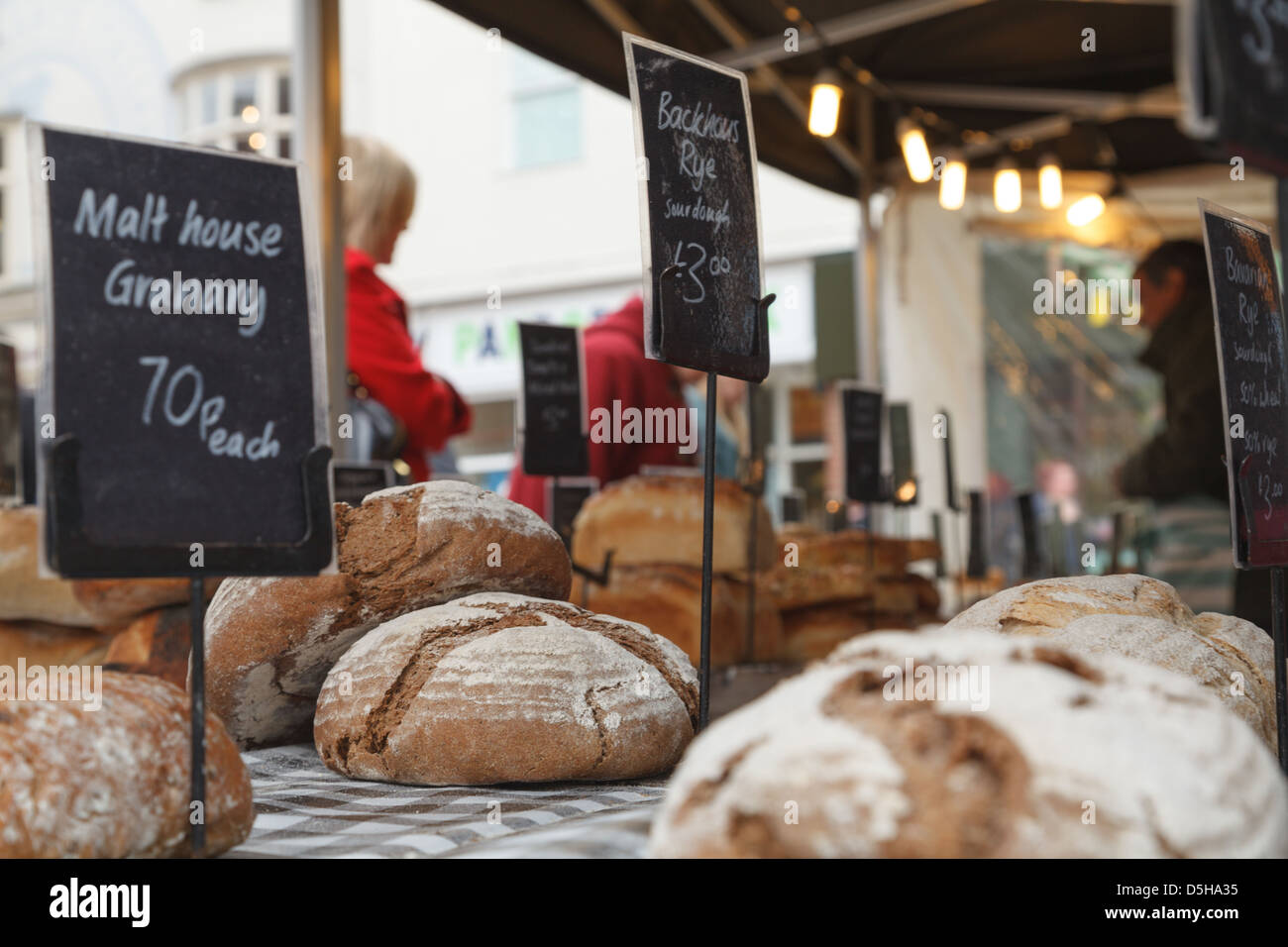 A local artisan bakery selling their loaves in a market in Basingstoke Town Centre Stock Photo