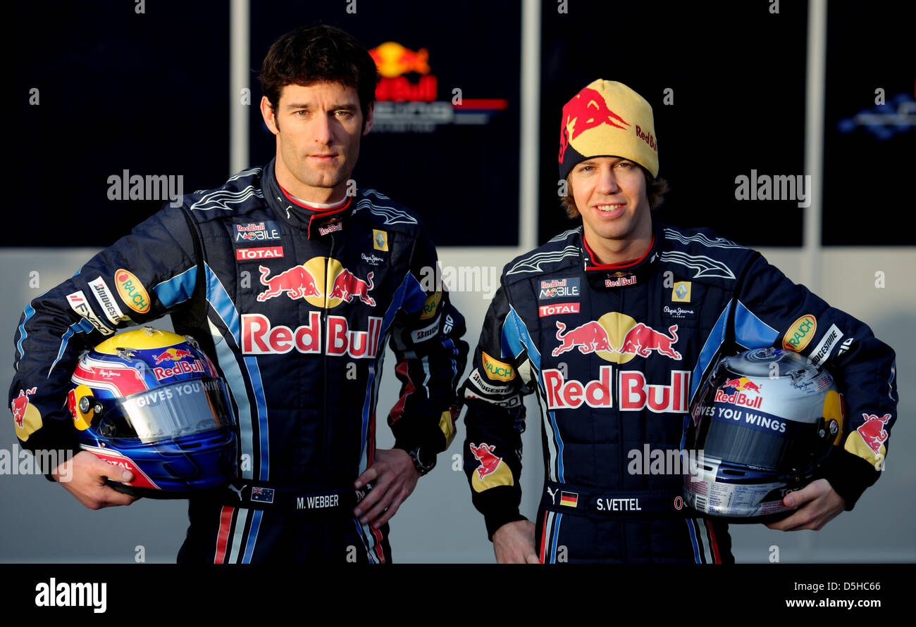 German Formula One driver Sebastian Vettel of Red Bull and his teammate, Australian driver Mark Webber (L), present the new Red Bull Racing race car RB6 in Jerez de la Frontera, Spain, 10 February 2010. Vice world champion Vettel will test the RB6 for the first time on 12 February 2010. The Formula One 2010 season will start on 14 March 2010 in Bahrain. Photo: Felix Heyder Stock Photo