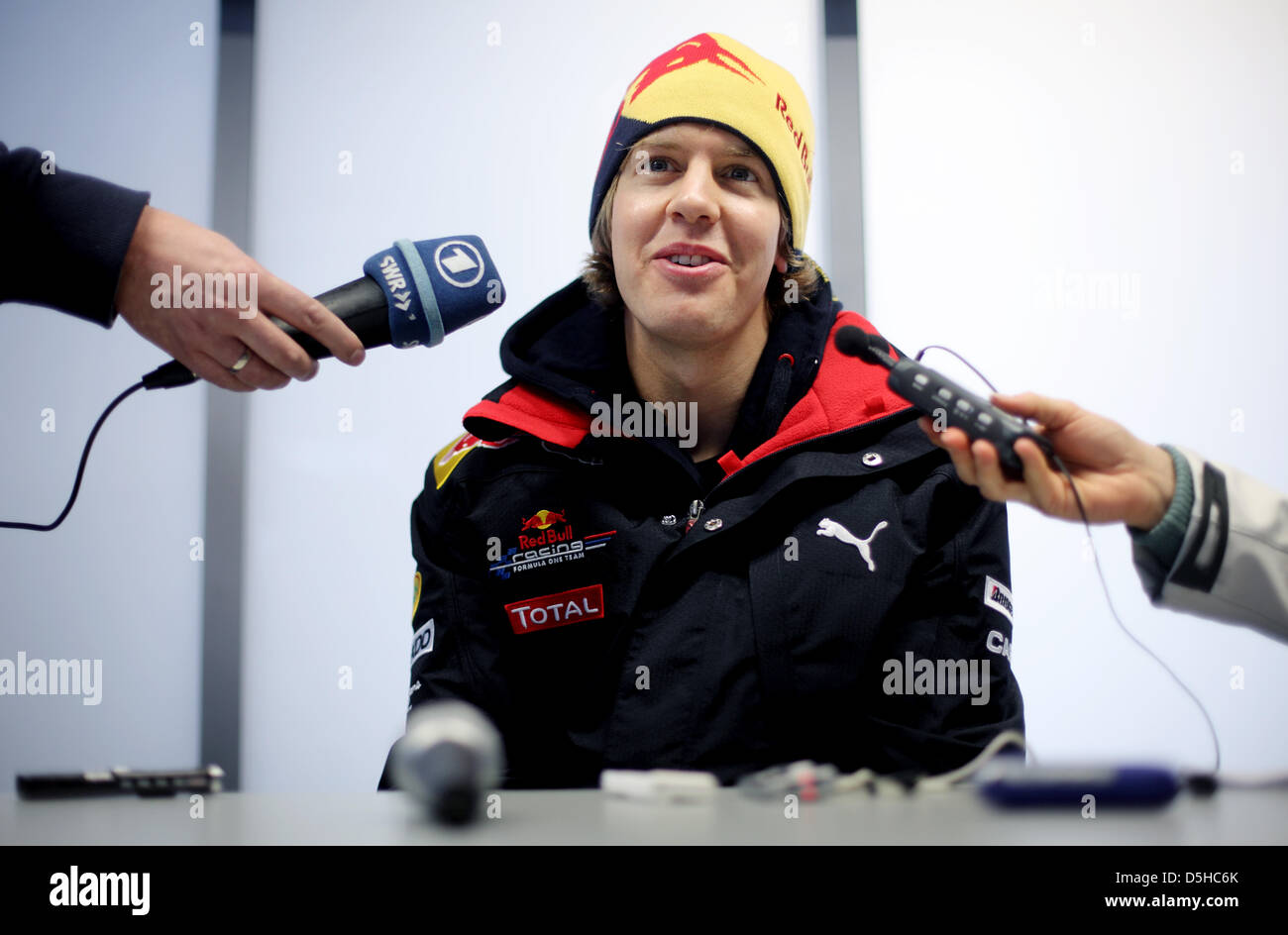 German Formula One driver Sebastian Vettel of Red Bull gives interviews at the presentation of the new Red Bull Racing race car RB6 in Jerez de la Frontera, Spain, 10 February 2010. Vice world champion Vettel will test the RB6 for the first time on 12 February 2010. The Formula One 2010 season will start on 14 March 2010 in Bahrain. Photo: Felix Heyder Stock Photo