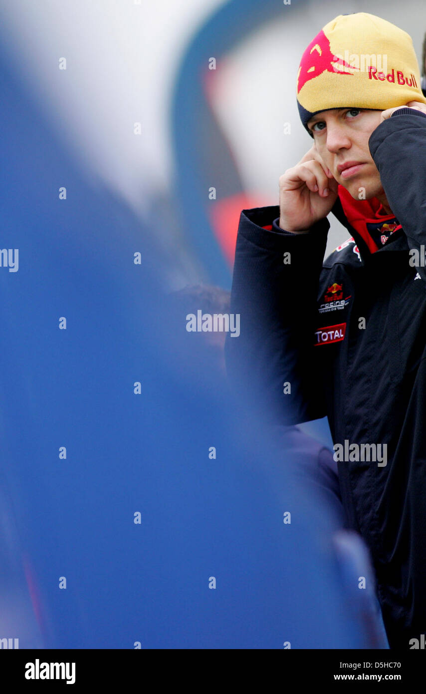 German Formula One driver Sebastian Vettel of Red Bull pictured in the pit lane after the presentation of the new Red Bull Racing race car RB6 in Jerez de la Frontera, Spain, 10 February 2010. Vice world champion Vettel will test the RB6 for the first time on 12 February 2010. The Formula One 2010 season will start on 14 March 2010 in Bahrain. Photo: Felix Heyder Stock Photo