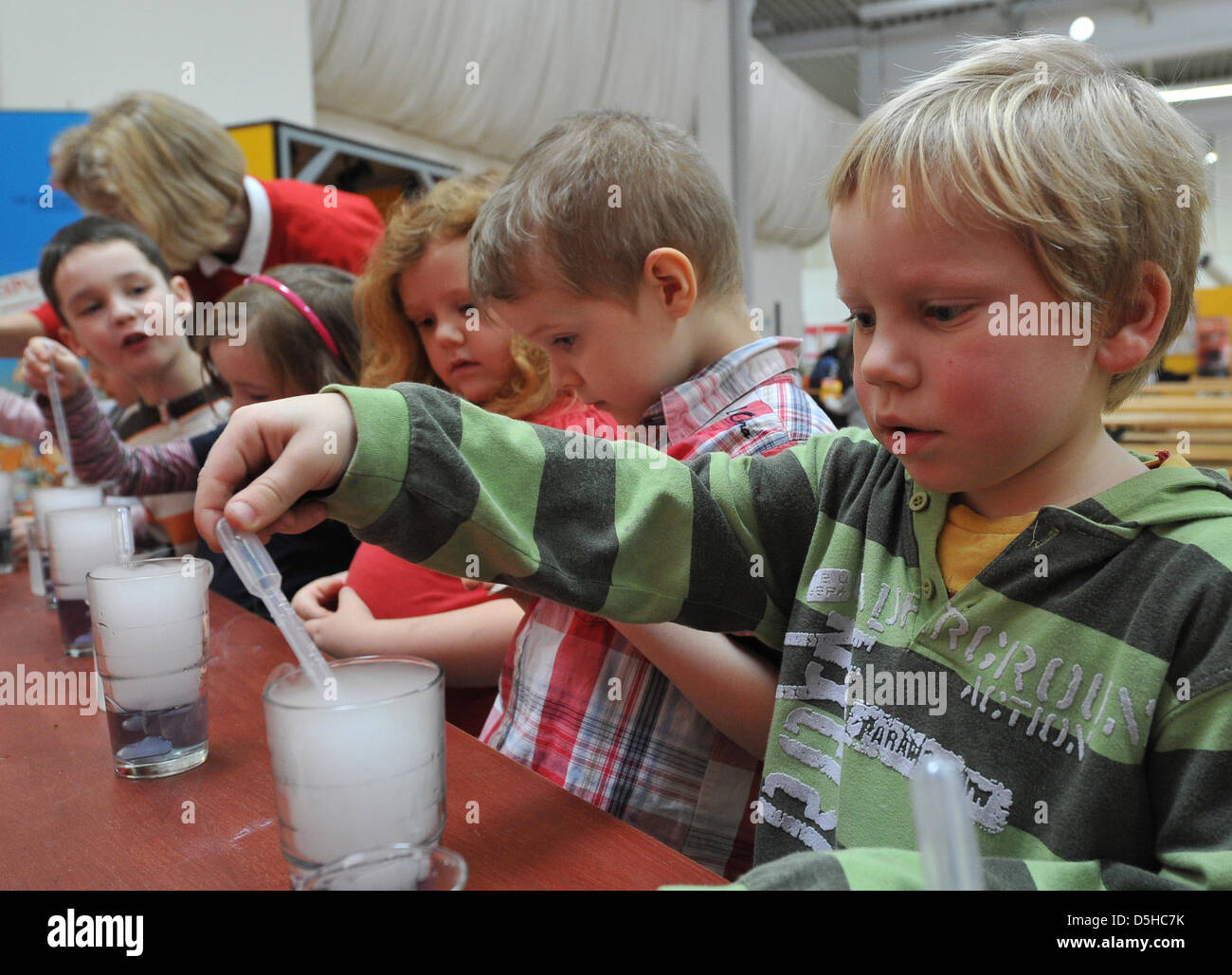 Children of the Klax kindergarten Salamander in Berlin check out an