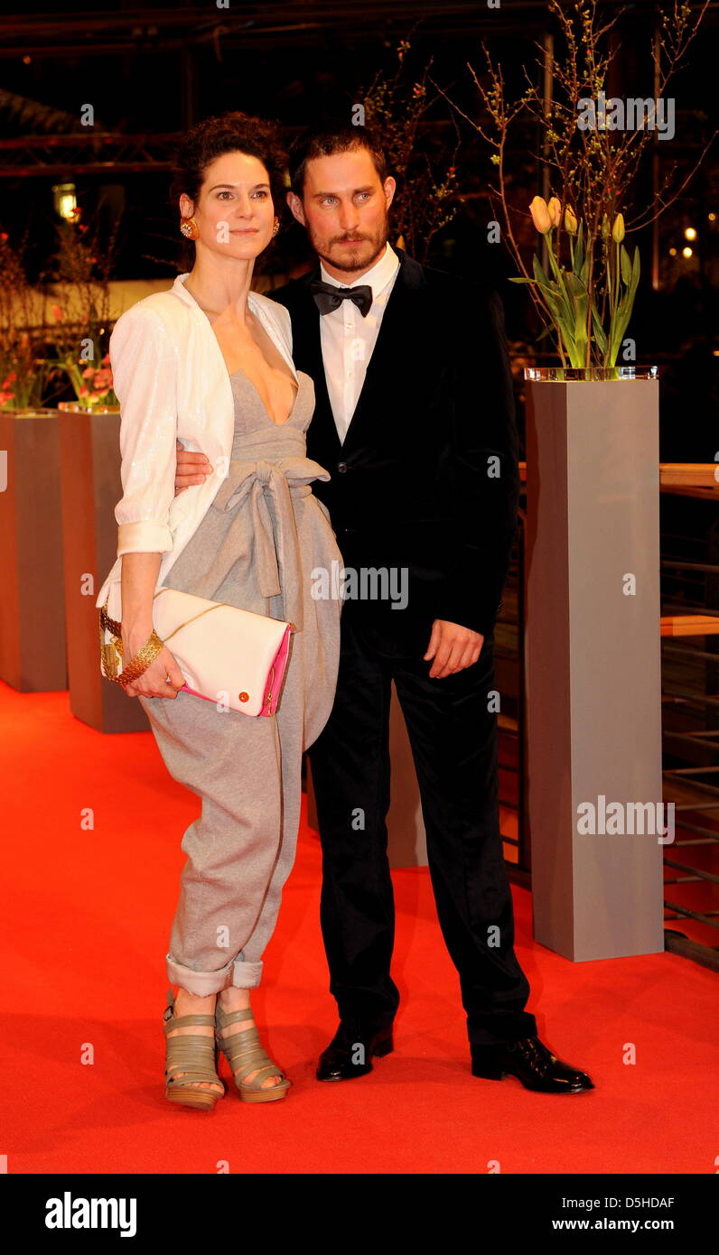 German actor Clemens Schick and his partner Bibiana Beglau arrive for the premiere of the film 'Tuan Yuan' (Apart Together) running in competition Thursday, 11 February 2010, during the 60th Berlinale international film festival in Berlin. Photo: Soeren Stache Stock Photo