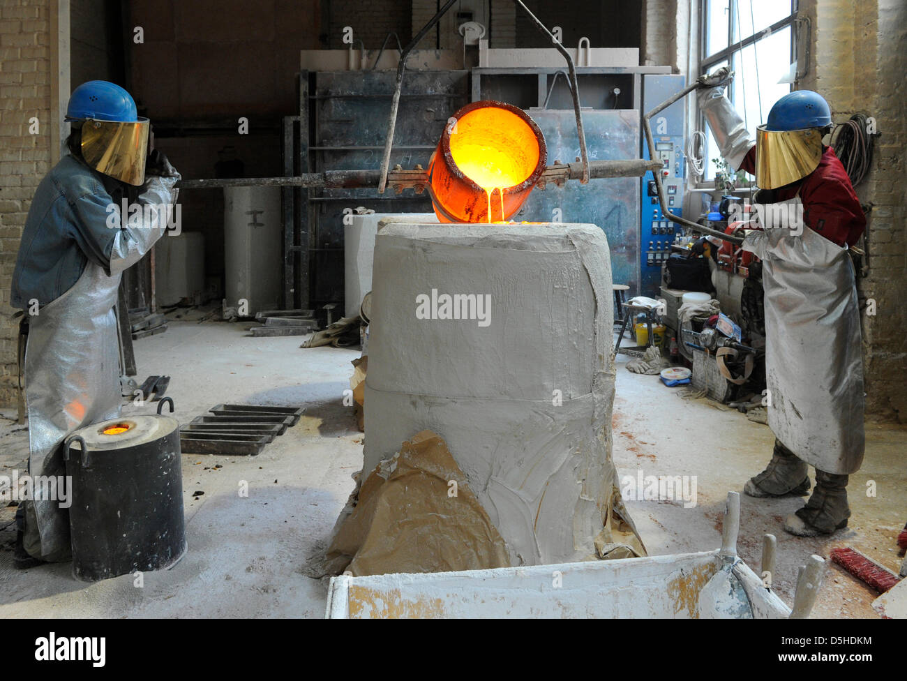 Liquid bronze is prepared to cast Golden and Silber Bears at Noack foundry  in Berlin, Germany, 08 February 2010. Sionce 1951, the Golden and Silver  Bear are the top prizes awarded at