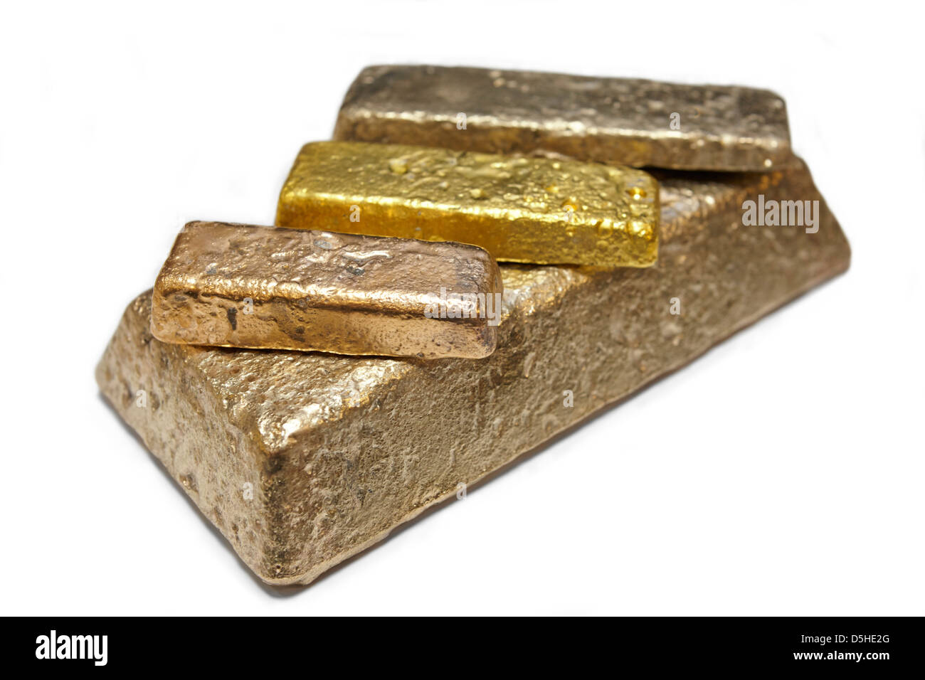Rough cast gold bullion bars in different colour golds Stock Photo