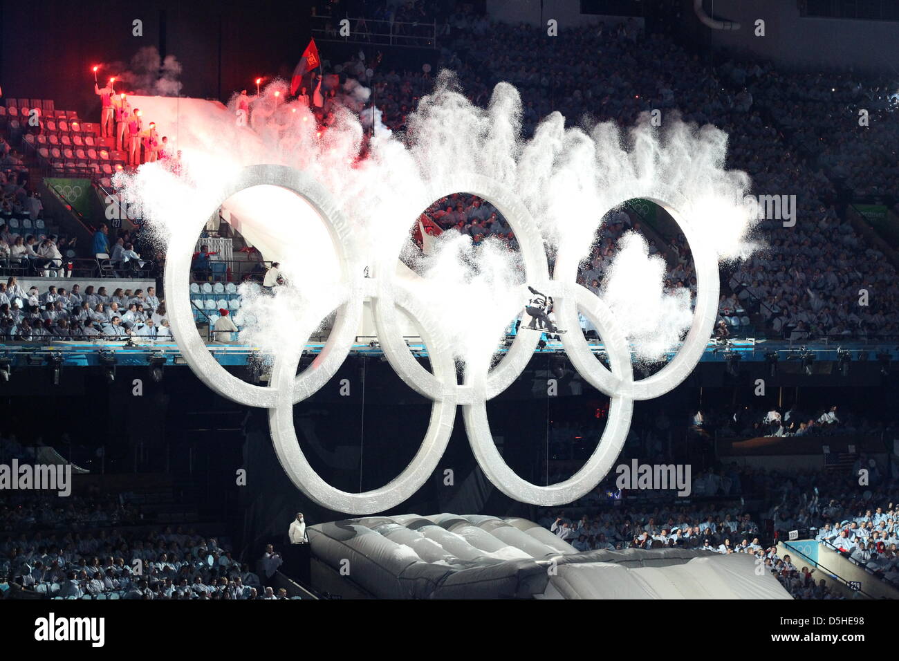 A snowboarder jumps through the Olympic Rings during the Opening Ceremony of the Vancouver 2010 Olympic Games, at the BC Place Stadium, Vancouver, Canada, 12 February 2010.  +++(c) dpa - Bildfunk+++ Stock Photo