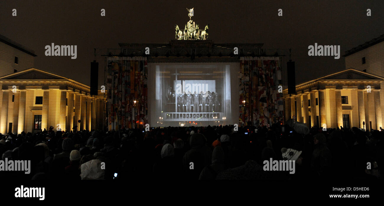 On the occaision of the 60th Berlinale film festival, the silent film classic ''Metropolis'' is shown for the first time after 83 years in a almost full length version in front of Brandenburg Gate in Berlin, Germany, 12 February 2010. After the surprising find of an original version from the masterpiece by Fritz Lang in Argentina two years ago, the film was able to be restored in p Stock Photo