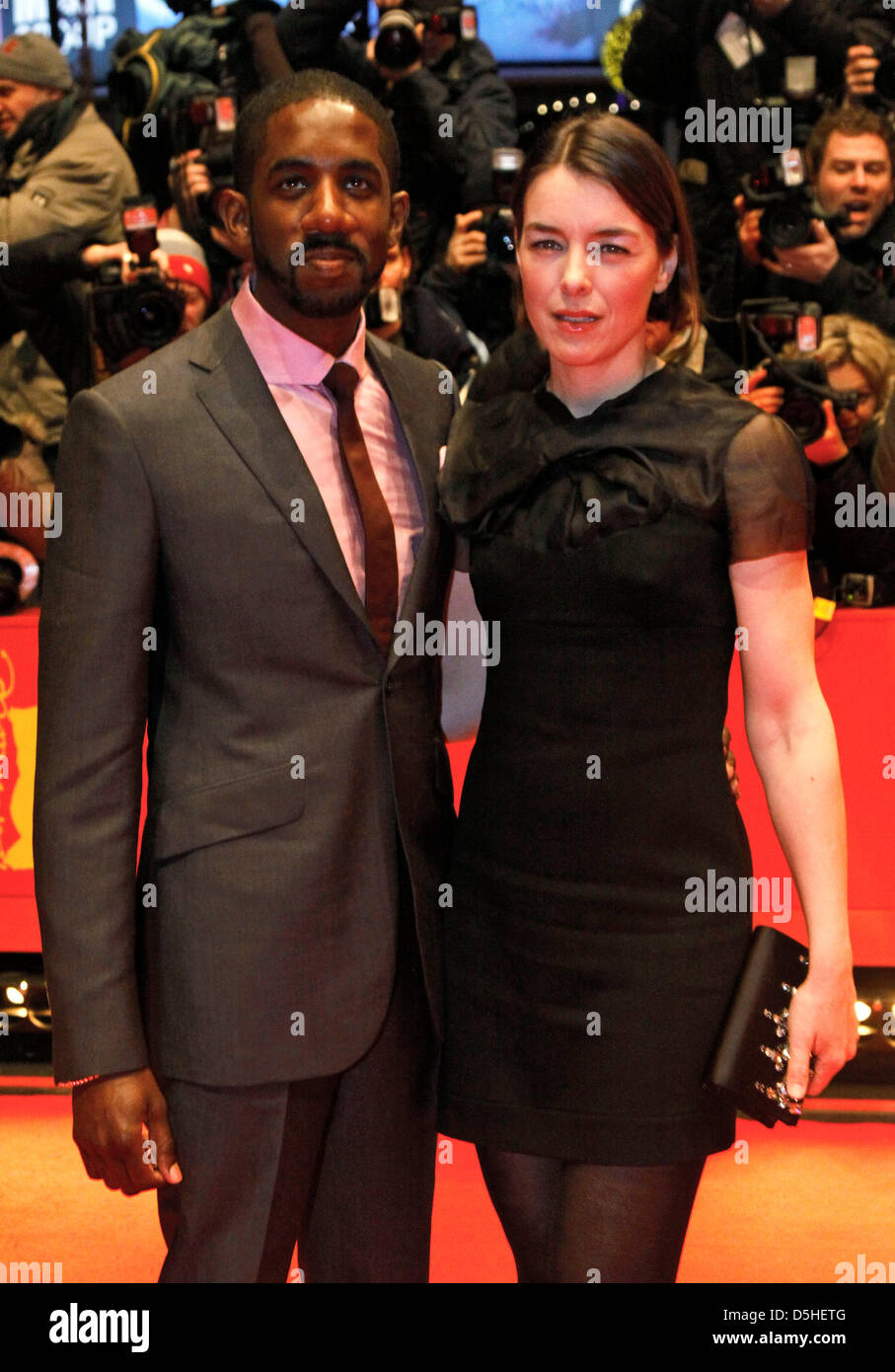 British actress Olivia Williams and her husband Rashan Stone arrive for the premiere of the film 'The Ghost Writer' during the 60th Berlinale International Film Festival in Berlin, Germany, 12 February 2010. The festival runs until 21 Febuary 2010. Photo: Hubert Boesl Stock Photo