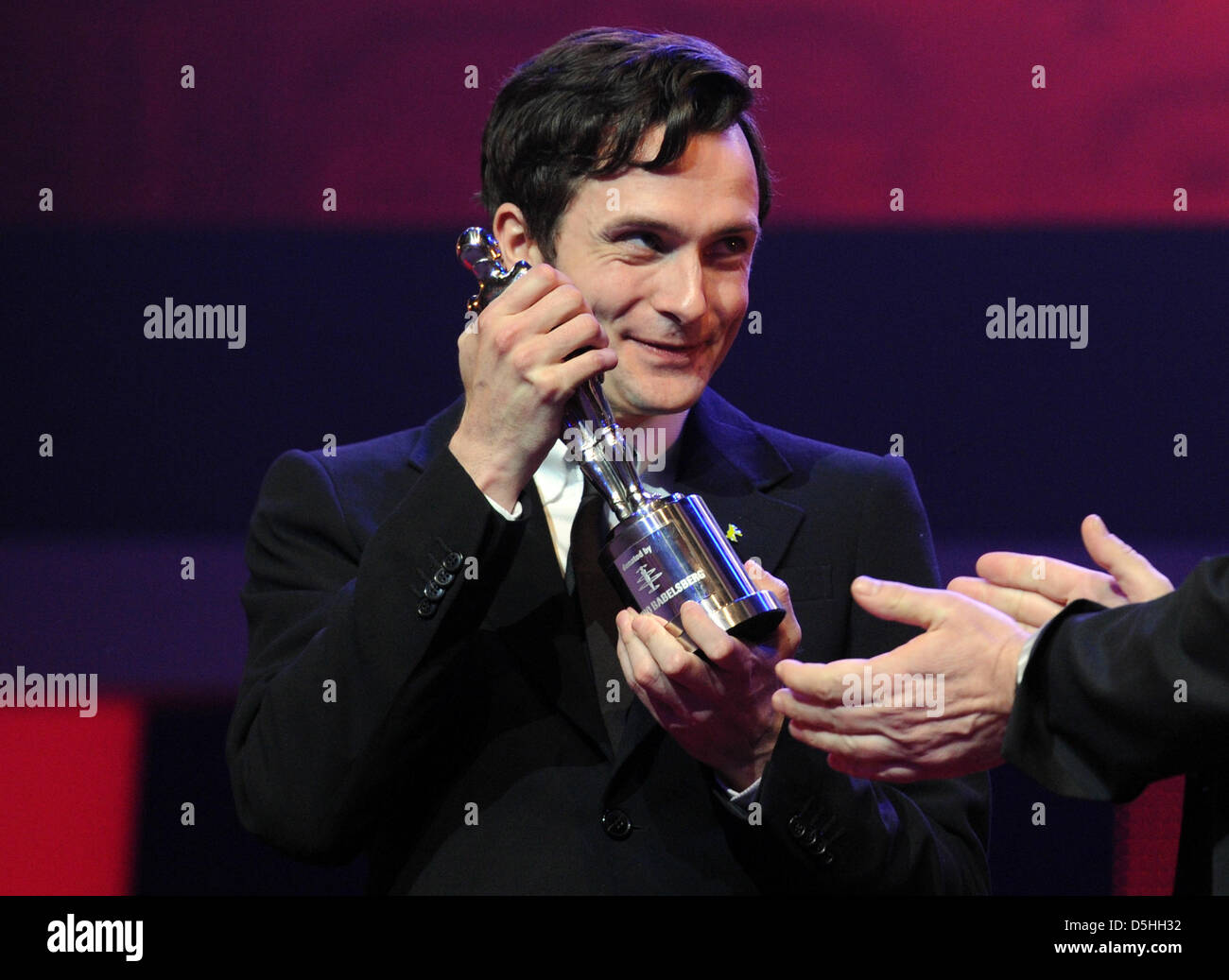 Edward Hogg (United Kingdom) receives Shooting Star trophy 2010 during the award ceremony at the 60th Berlinale International Film Festival in Berlin, Germany, on Monday, 15 February 2010. The festival runs until 21 Febuary 2010. Photo: Marcus Brandt dpa/lbn  +++(c) dpa - Bildfunk+++ Stock Photo
