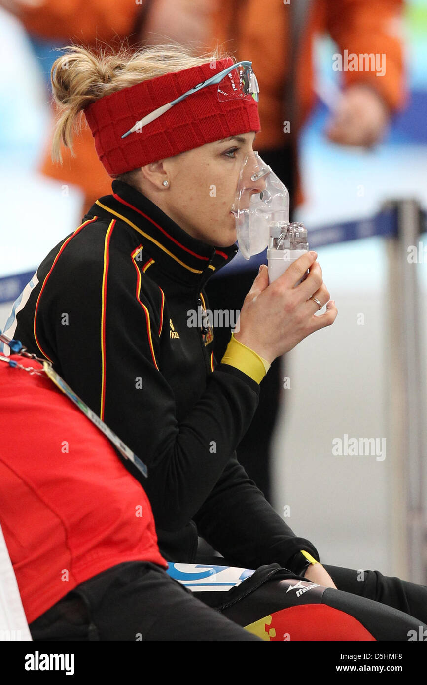 Anni Friesinger-Postma of Germany uses an oxygen mask prior to the Speed Skating women's 1000m at the Richmond Olympic Oval during the Vancouver 2010 Olympic Games, Vancouver, Canada, 18 February 2010. Stock Photo