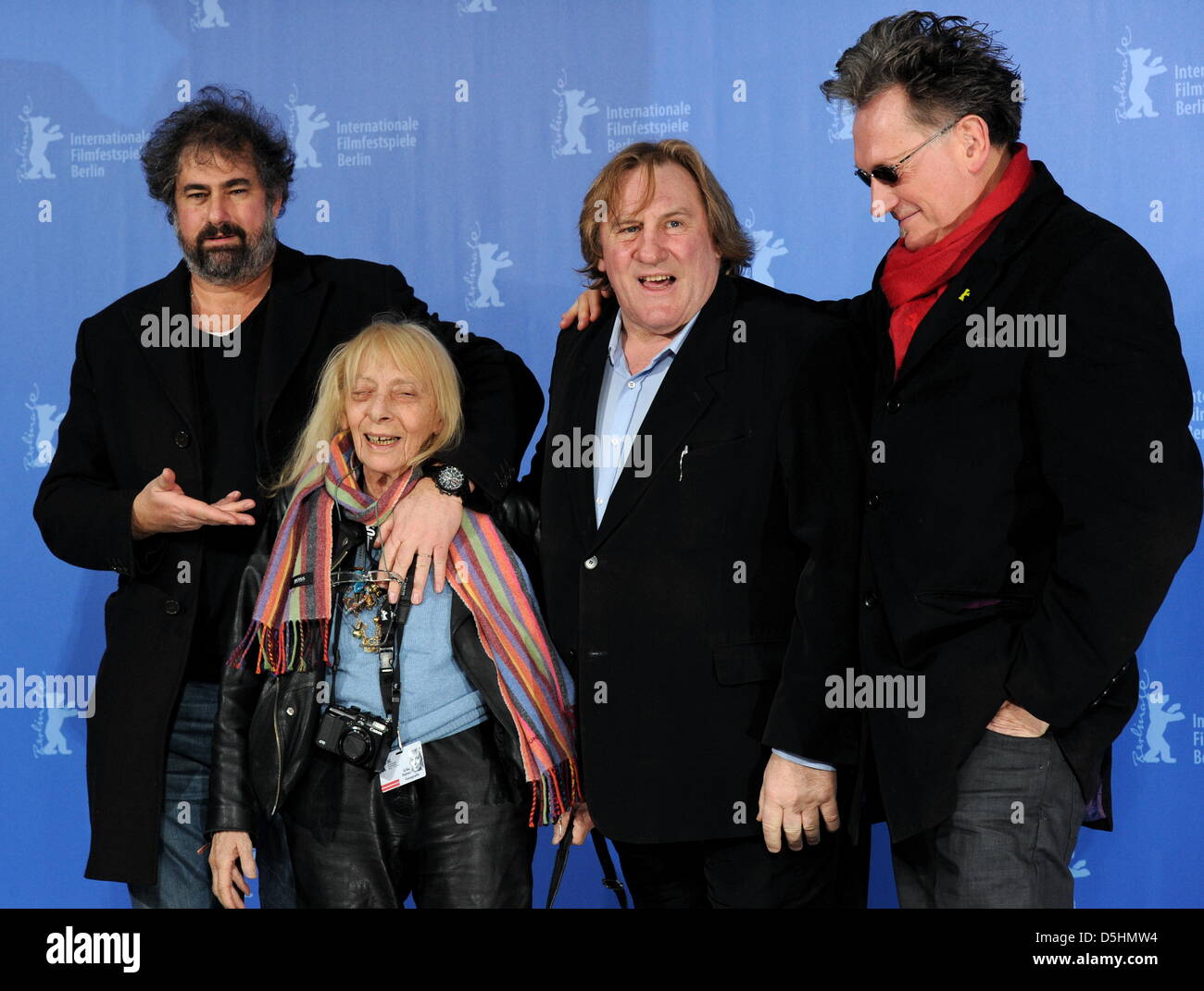 French directors Benoit Delepine (R), Gustave Kervern (L), French actor Gerard Depardieu (2nd R) and Berlinale photographer Erika Rabau pose during the photocall of the film 'Mammuth' running in competition during the 60th Berlinale International Film Festival in Berlin, Germany, Friday, 19 February 2010. The festival runs until 21 February 2010. Photo: Tim Brakemeier dpa/lbn  +++( Stock Photo