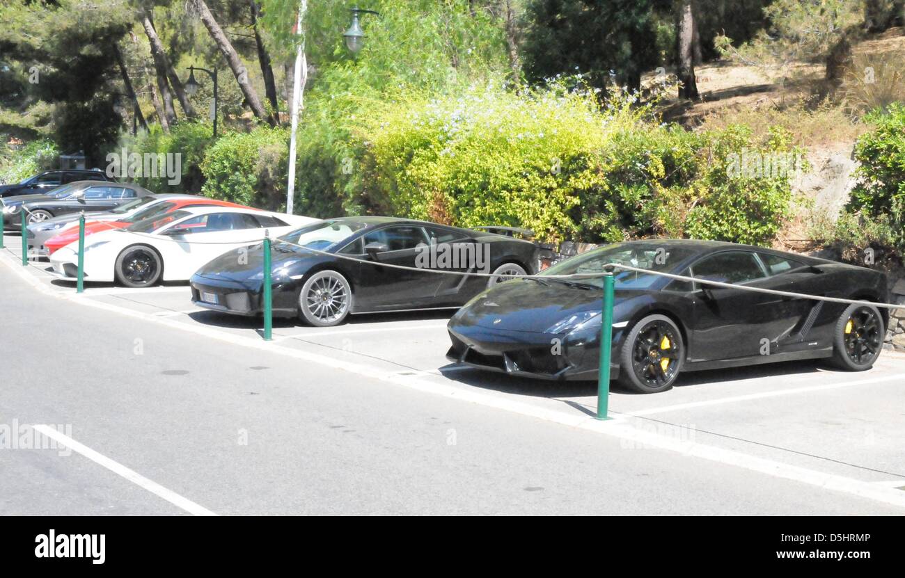 View on luxury sports cars in Saint-Tropez, France, 08 August 2010. The rich and famous are set to show off at southern France's jet set hotspot again. Photo: Stephan Witte Stock Photo