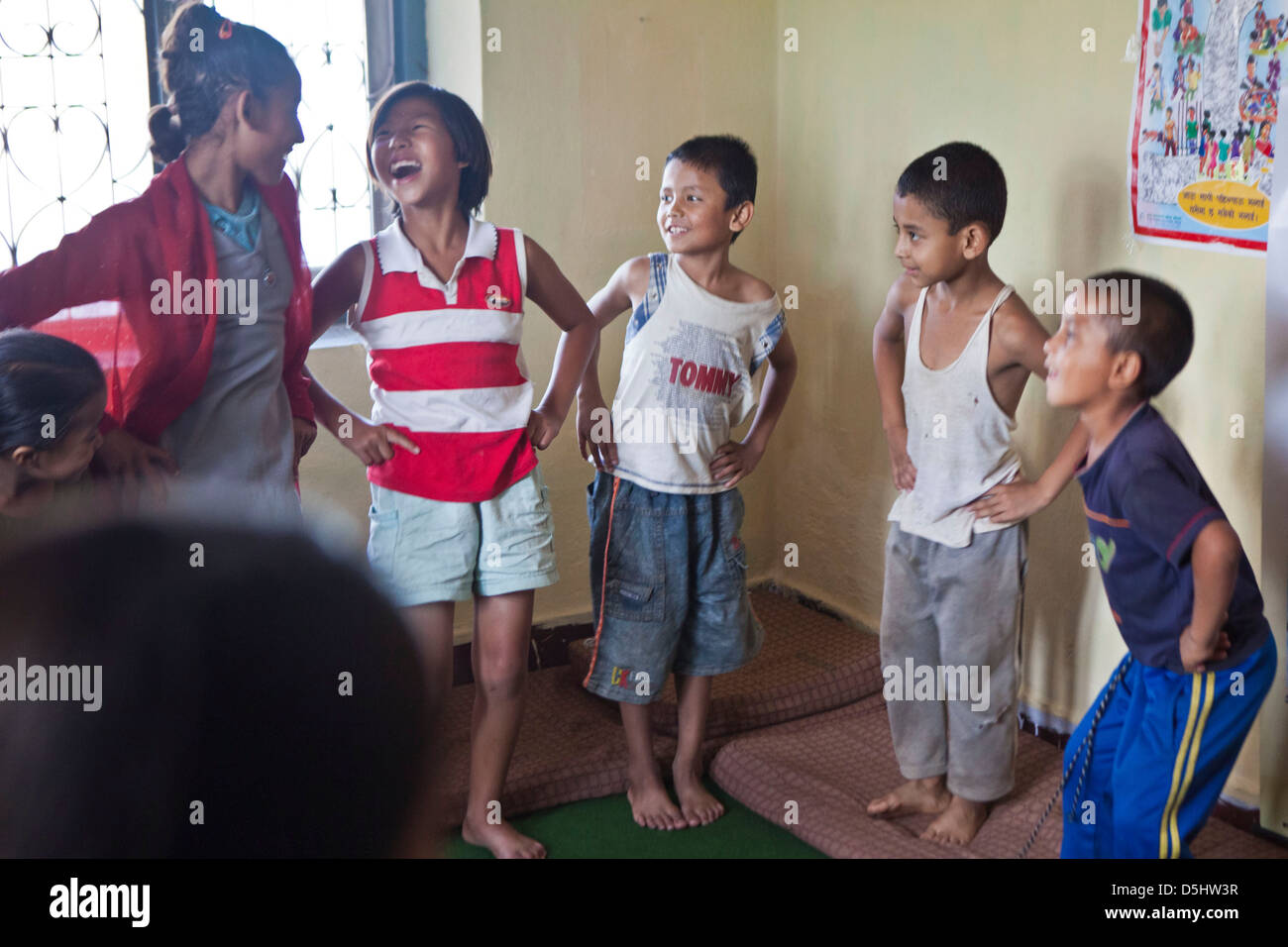 Play session with young street-children at Voice for Children rehabilitation center in Kathmandu, Nepal. Stock Photo