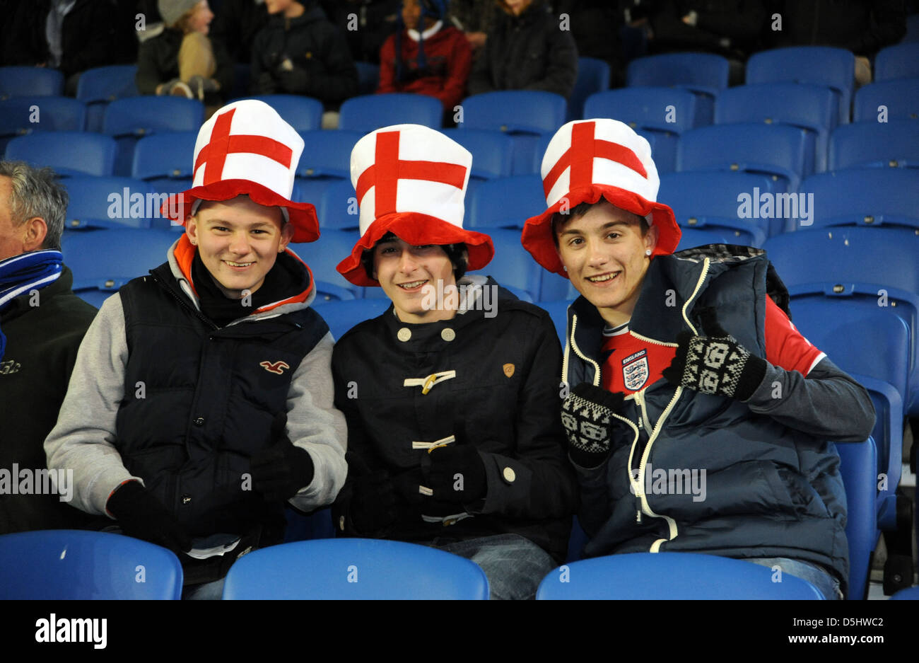 Young England football male fans wearing large memorabilia hats Stock Photo