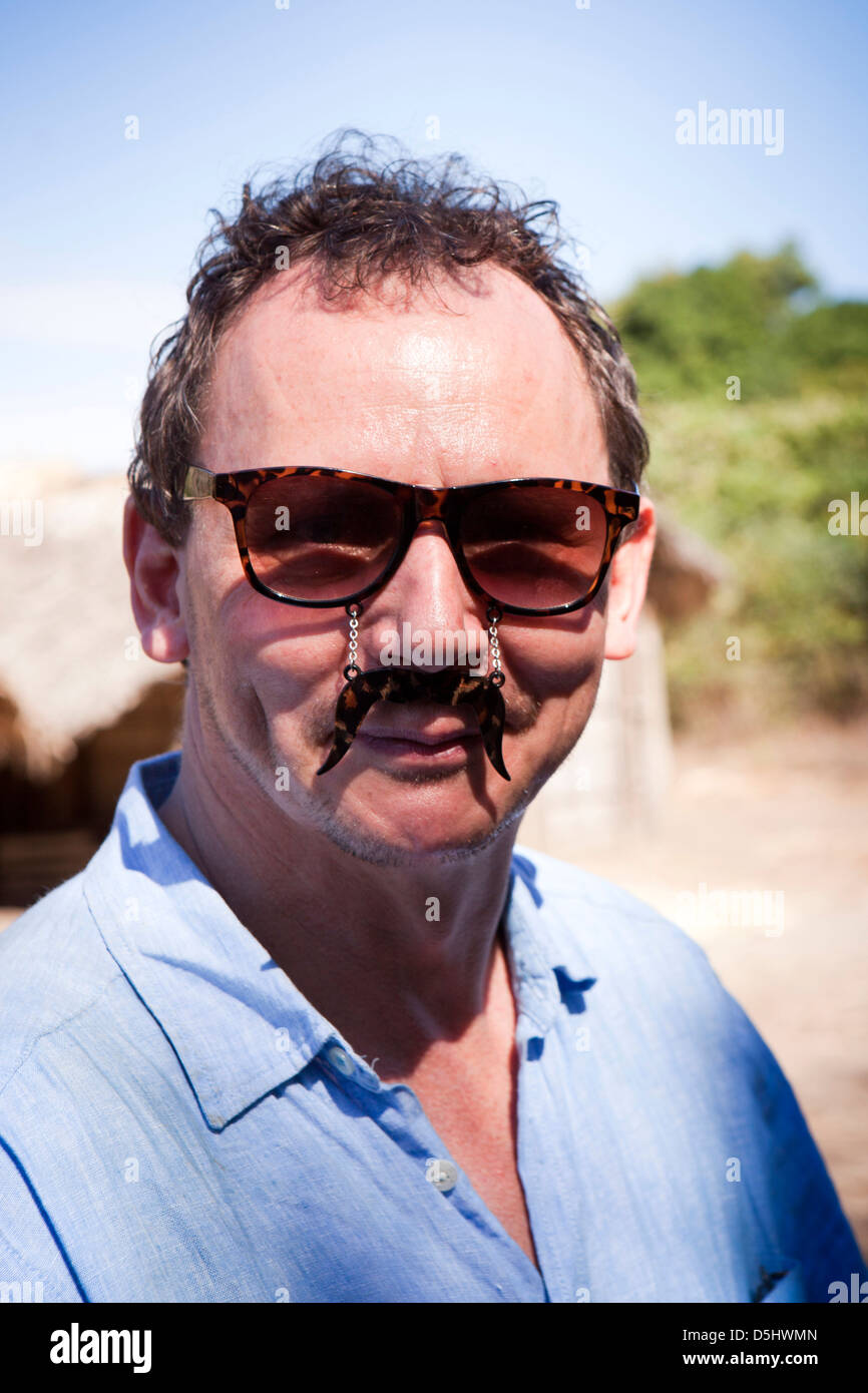 Madagascar, Operation Wallacea, Matsedroy man wearing comedy moustache glasses Stock Photo
