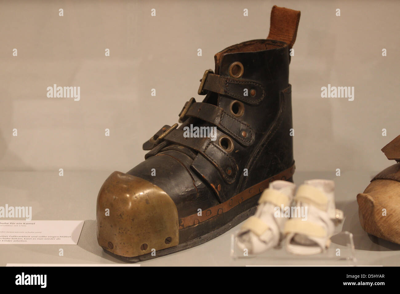 Divinf boots made of leather and lead are on display in Bonn, Germany, 19  September 2012. The exhibition 'Shoe Tic' presents footwear from as far back  in history as the era of