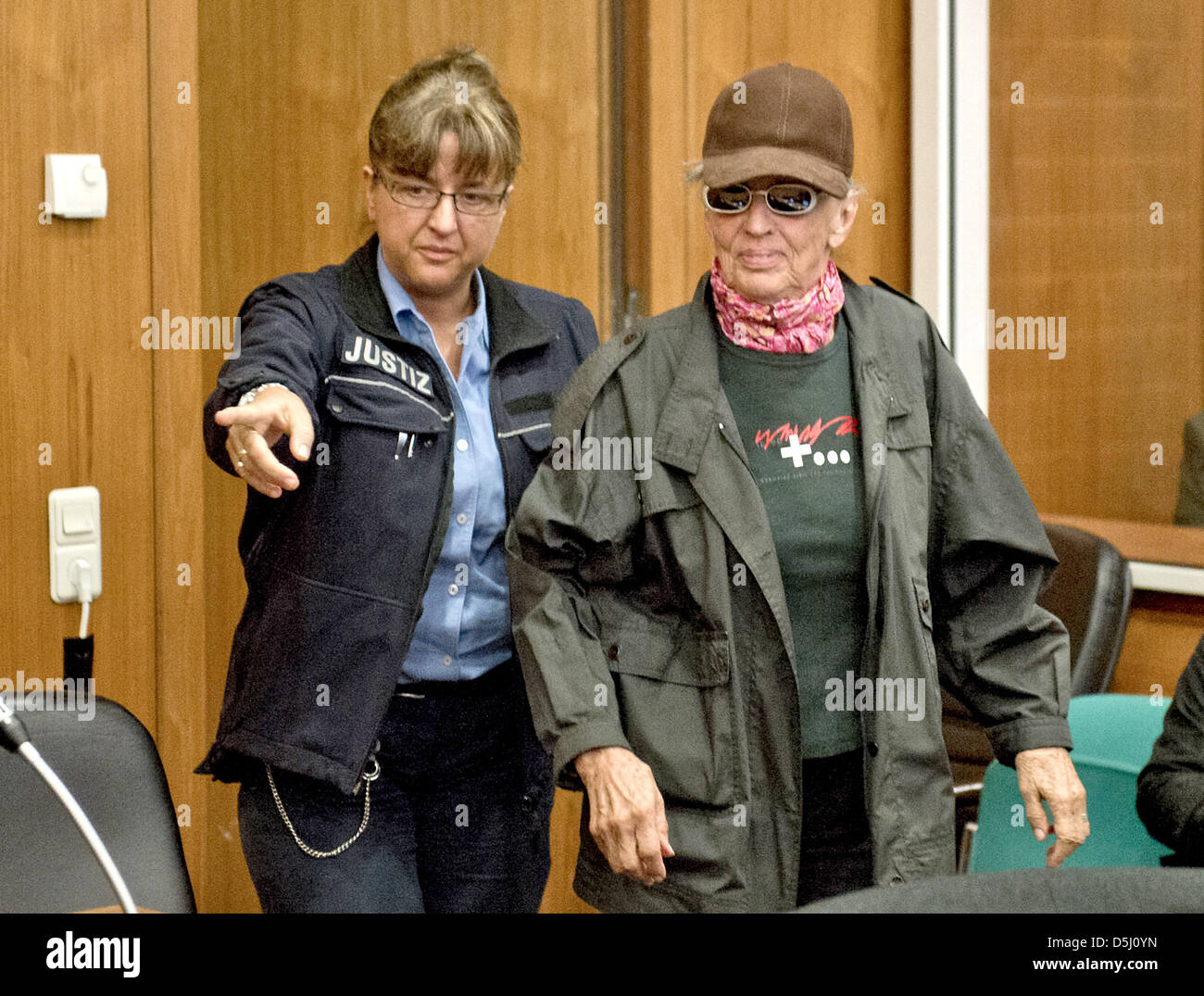 Defendant Sonja Suder (R), accused of being involved in a terror attack against the Viennese OPEC headquarters in 1975, arrives at the district court in Frankfurt Main, Germany, 21 September 2012. Suger and her partner Gauger were allegedly members of the leftist terror group 'Revolutionary Cells'. Photo: BORIS ROESSLER Stock Photo