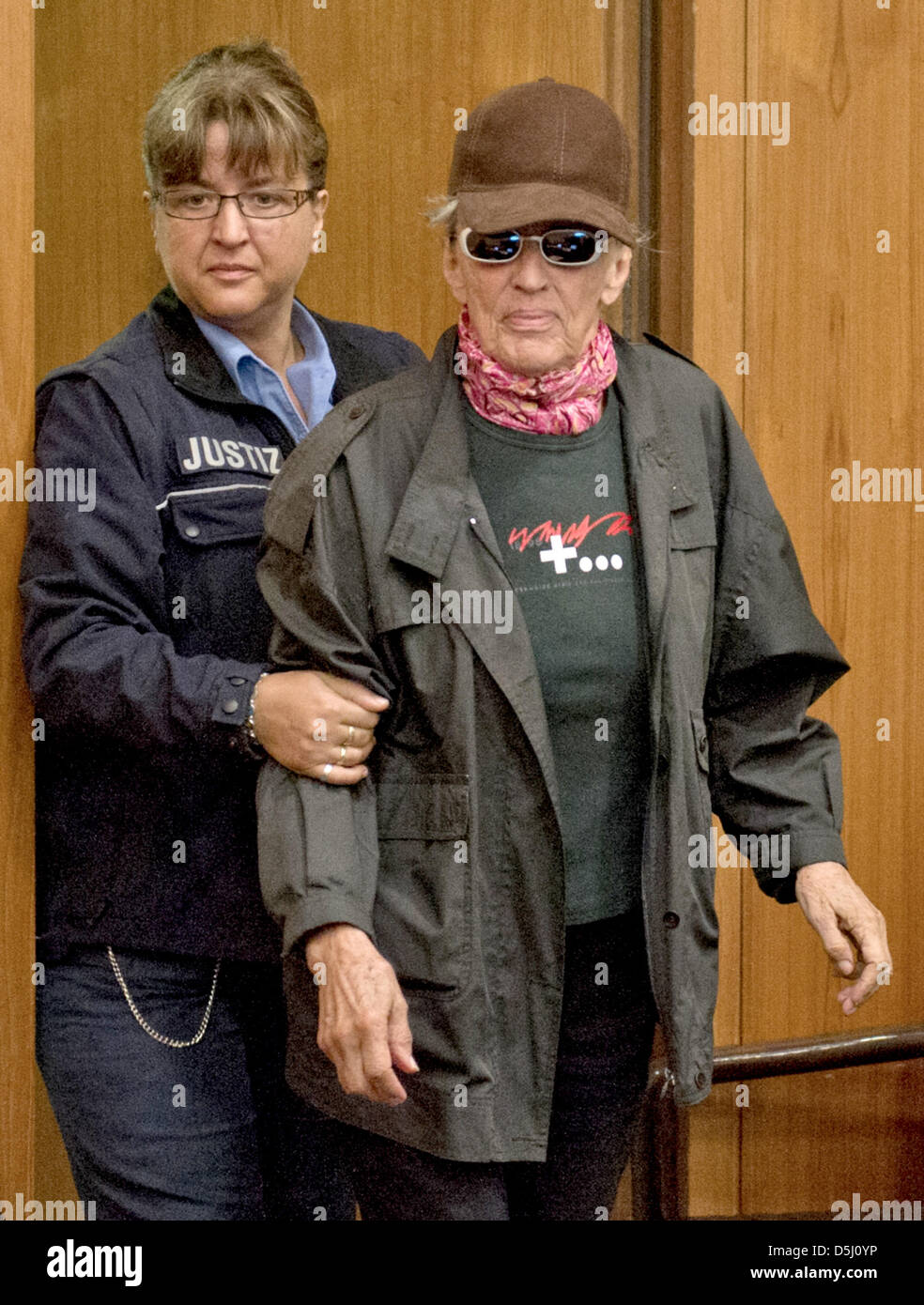 Defendant Sonja Suder (R), accused of being involved in a terror attack against the Viennese OPEC headquarters in 1975, arrives at the district court in Frankfurt Main, Germany, 21 September 2012. Suger and her partner Gauger were allegedly members of the leftist terror group 'Revolutionary Cells'. Photo: BORIS ROESSLER Stock Photo