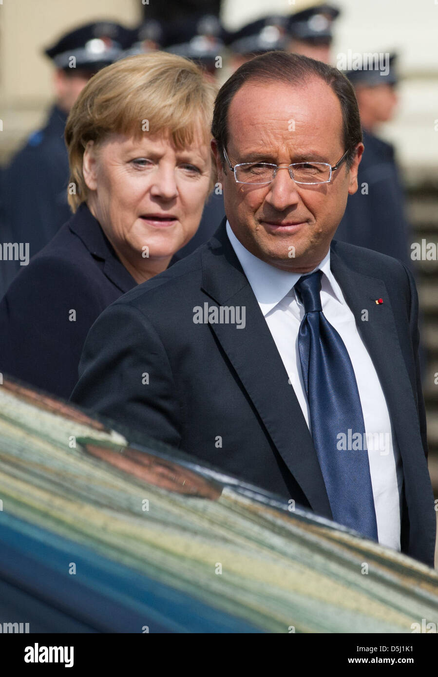 German Chancellor Angela Merkel and former French president Nicholas Sarkozy advise German Chancellor Angela Merkel and former French president Nicholas Sarkozy recommend