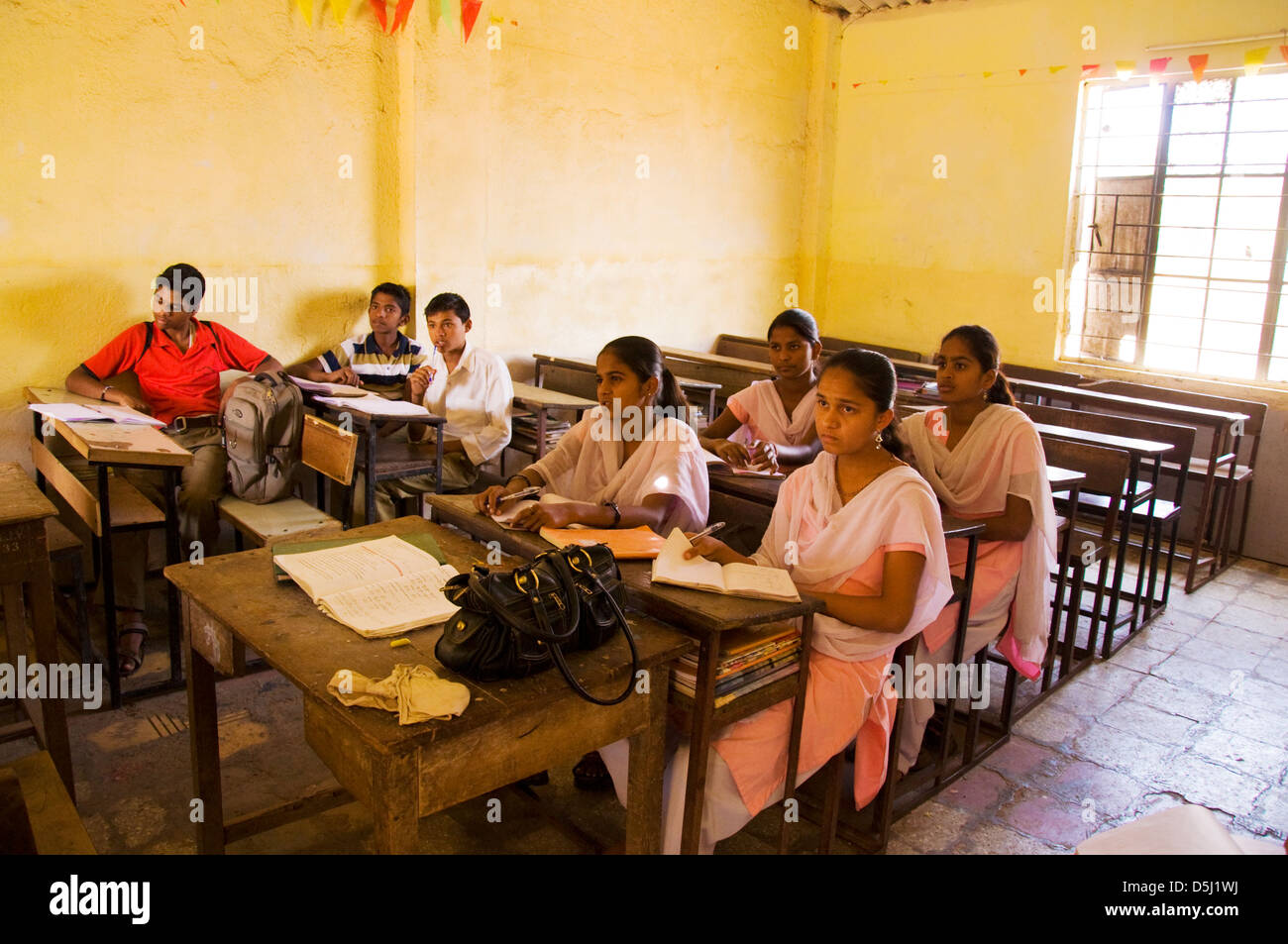 Pupils in mixed class at school in Asde Village Mulshi Valley Paud Maharashtra India Stock Photo