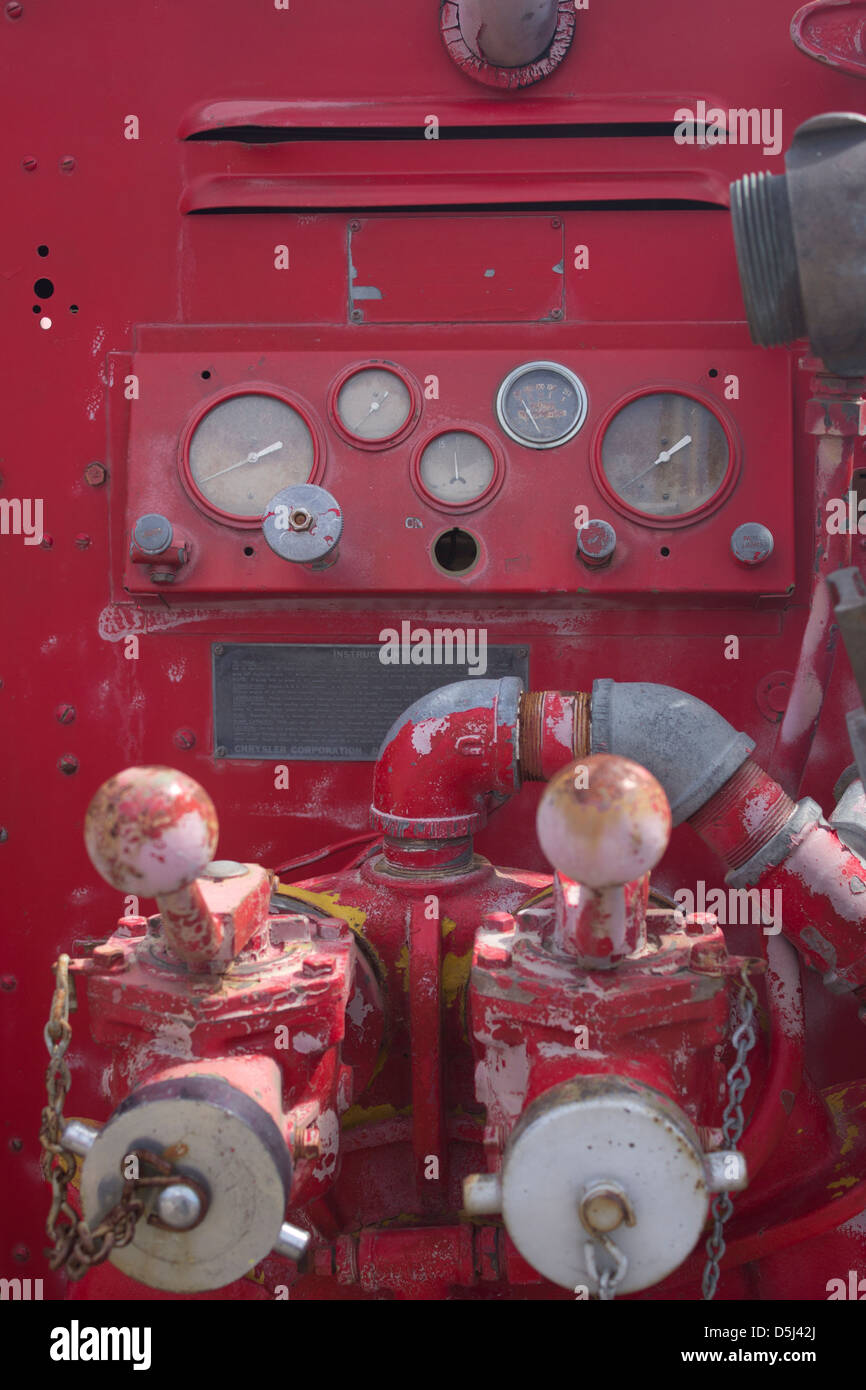 controls on the side of a fire engine with gauges Stock Photo Alamy