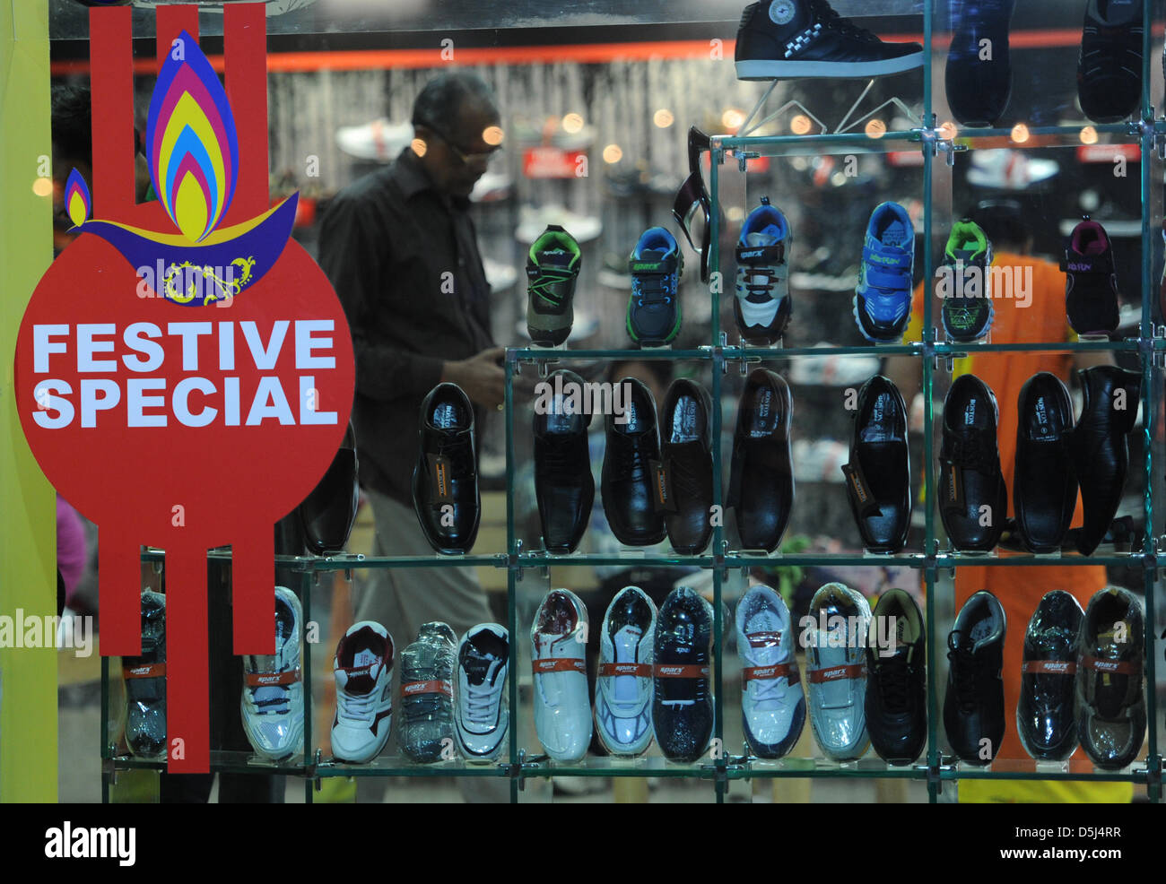 Shoes are on display in a shoe store prior to the Hindu celebration of