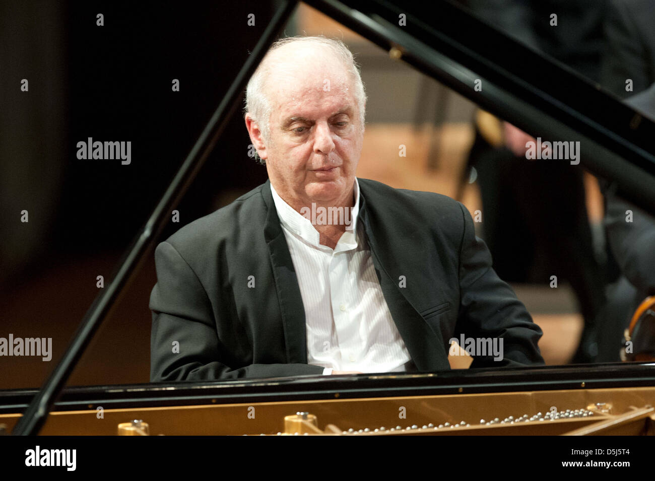 Conductor and pianist Daniel Barenboim plays the grand piano during his ...