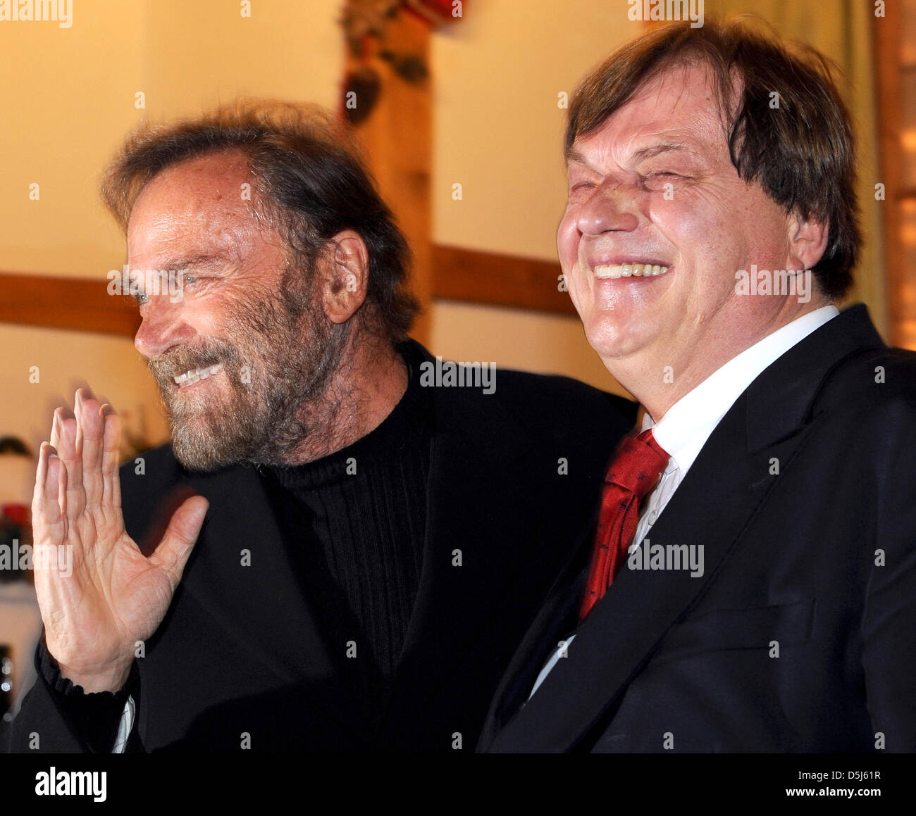 Italian actor Franco Nero and founder of the estate Aiderbichl Michael Aufhauser smile at the traditional Christmas exhibition at Gut Aiderbichl near Salzburg, Austria, 15 November 2012. Animals with sad or problematic backgrounds are taken care of at Gut Aiderbichl. Photo: Volker Dornberger Stock Photo