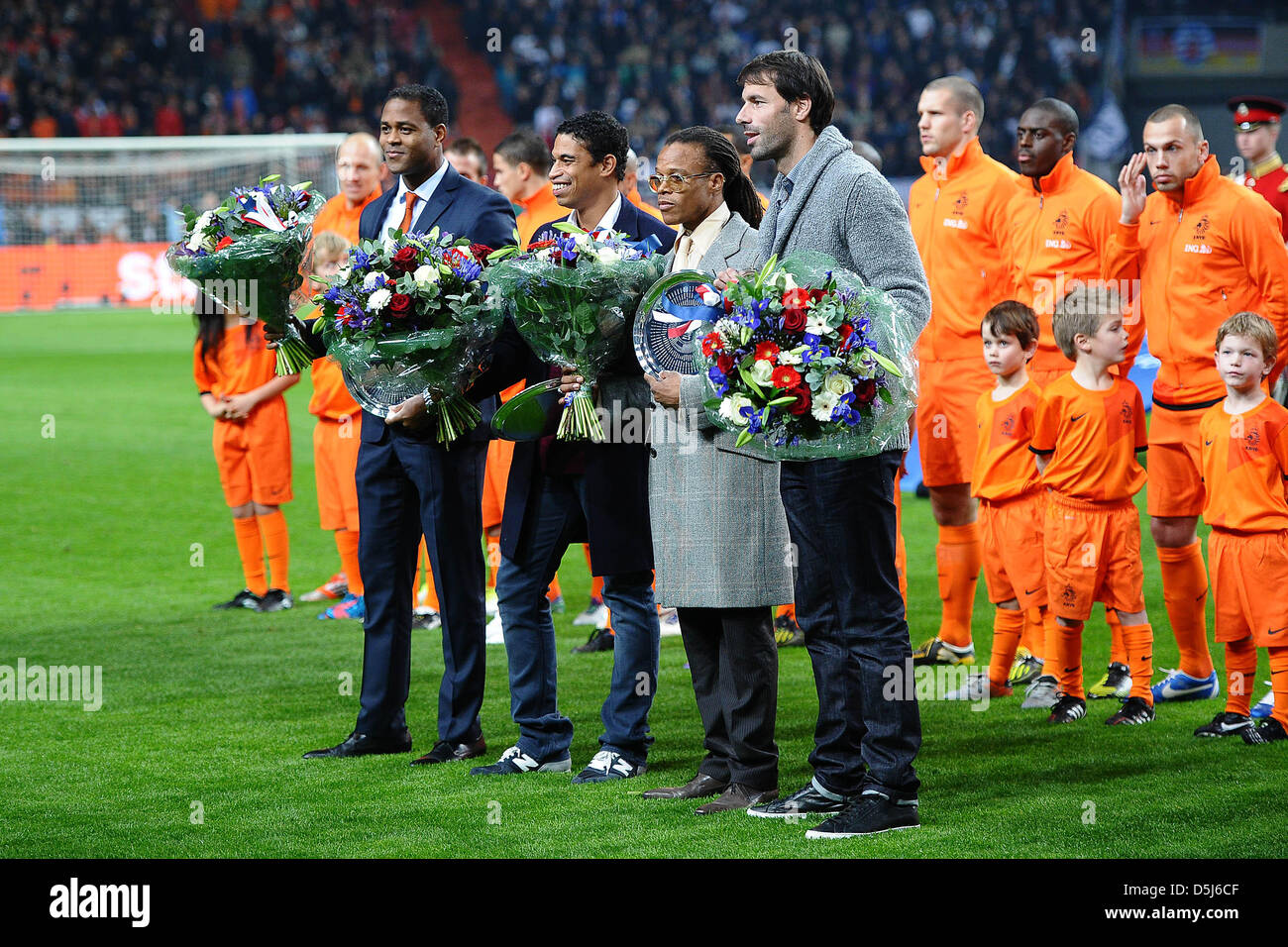 Assistand coach Patrick Kluivert (L-R), Alex Reizinger, Edgar Davids and Ruud van Nistelrooy are honored by the KNVB during the international match between the Netherlands and Germany at Amsterdam ArenA in Amsterdam, The Netherlands, 14 November 2012. Photo: Revierfoto Stock Photo
