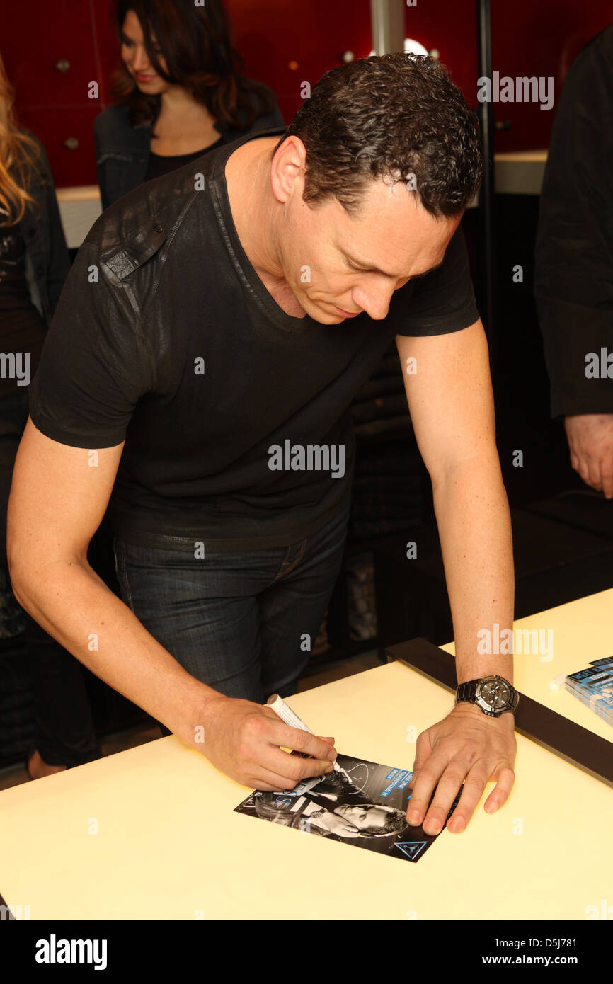 Dutch DJ and music producer Tiesto celebrates the opening of Guess flagship store opening in Munich and presents his club collection for Guess, 15 November 2012. Hendrik Ballhausen Stock Photo -