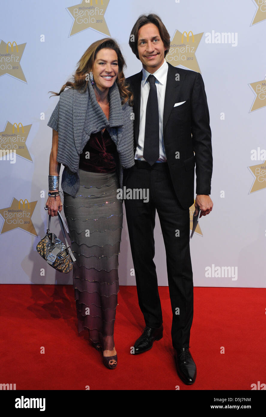 Former Austrian Finance Minister Karl-Heinz Grasser and his wife, entrepreneur Fiona Swarovski, arrive for the 25th jubilee benefit gala of the McDolands childrens foundation in Munich, Germany, 16 November 2012. Photo: Andreas Gebert Stock Photo