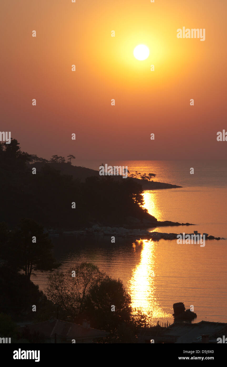 Greek island September View from Golden beach Chrisi Ammoudia Skala Panagias eastward to dawn sunrise Stock Photo