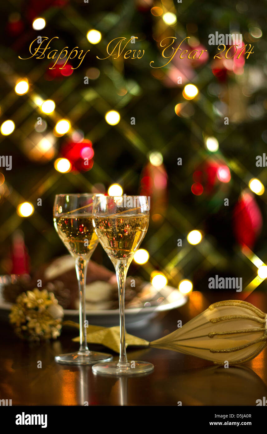 Happy New Year 2014 - champagne and party decoration Stock Photo