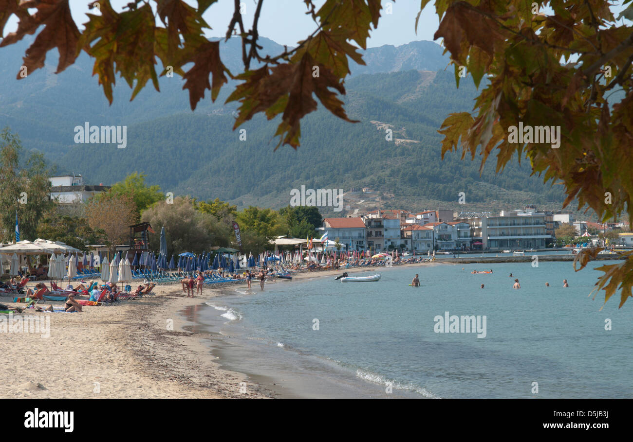 The beach at Limenas Thassos Town Elevated view along the shore with resort hotels and beachfront tavernas A sand beach Stock Photo