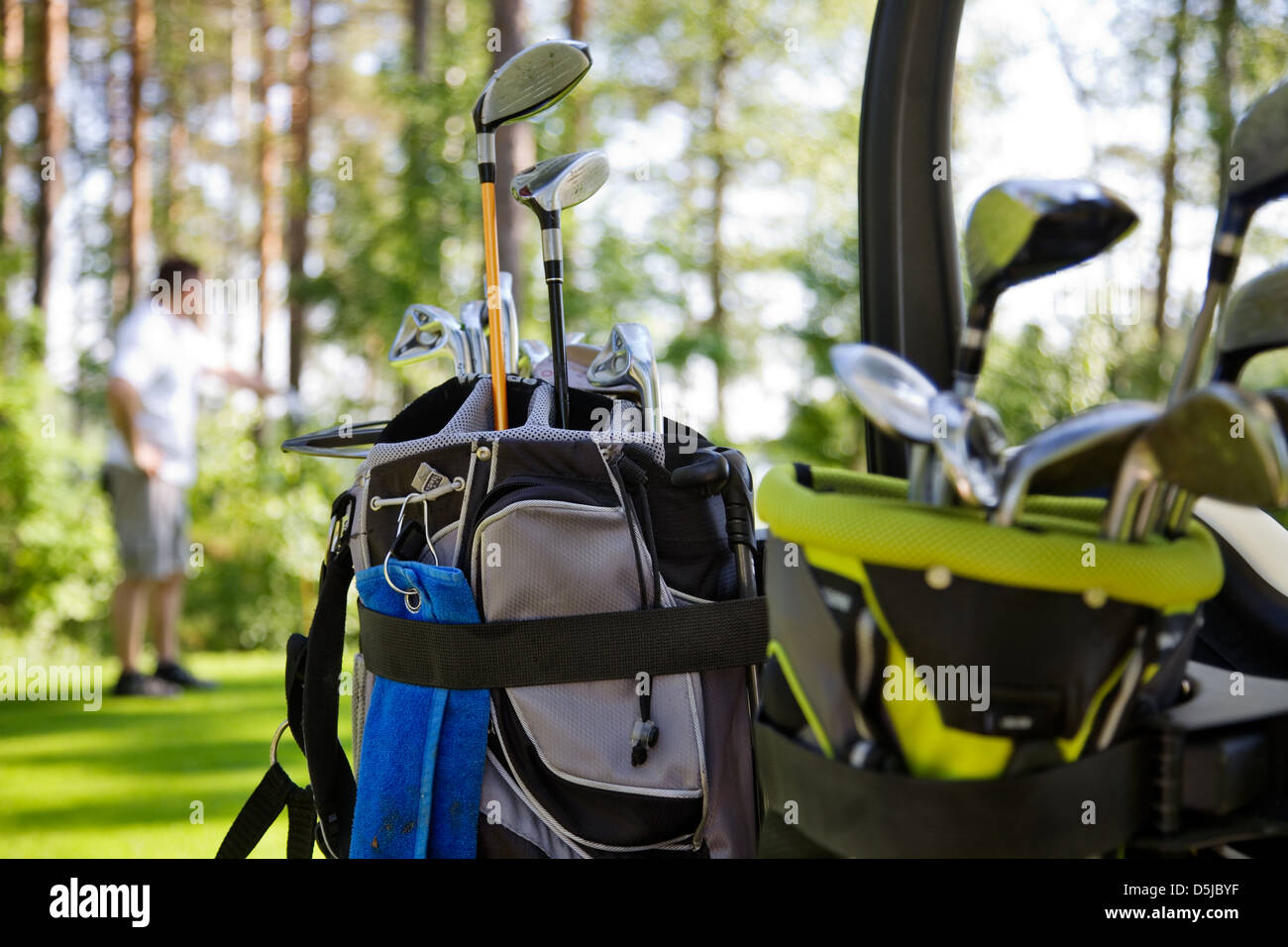Dirty golf clubs in buggy, selective focus Stock Photo Alamy