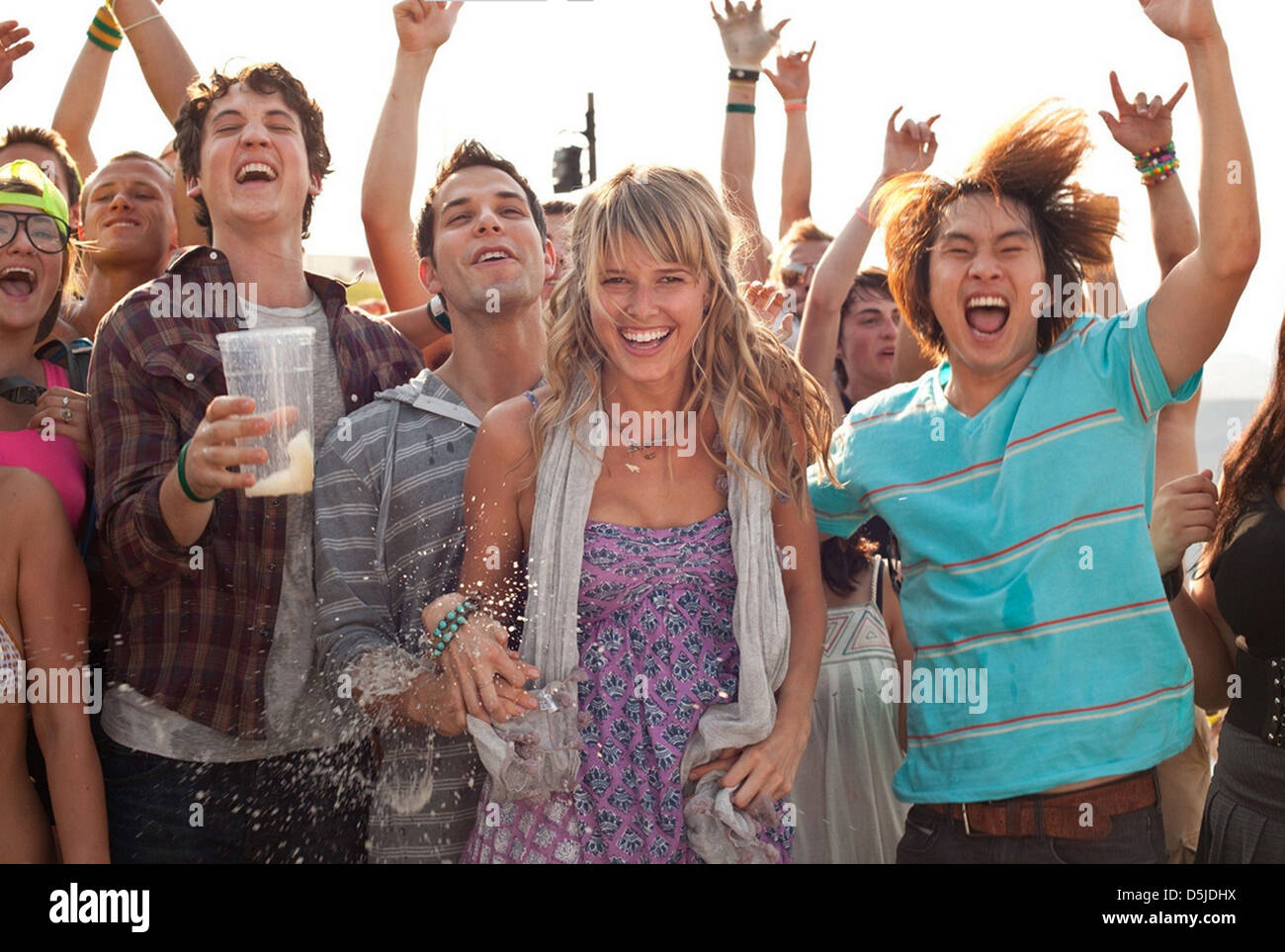 21 AND OVER Relativity Media film with from l: Miles Teller, Skylar Austin, Sarah Wright, Justin Chon Stock Photo