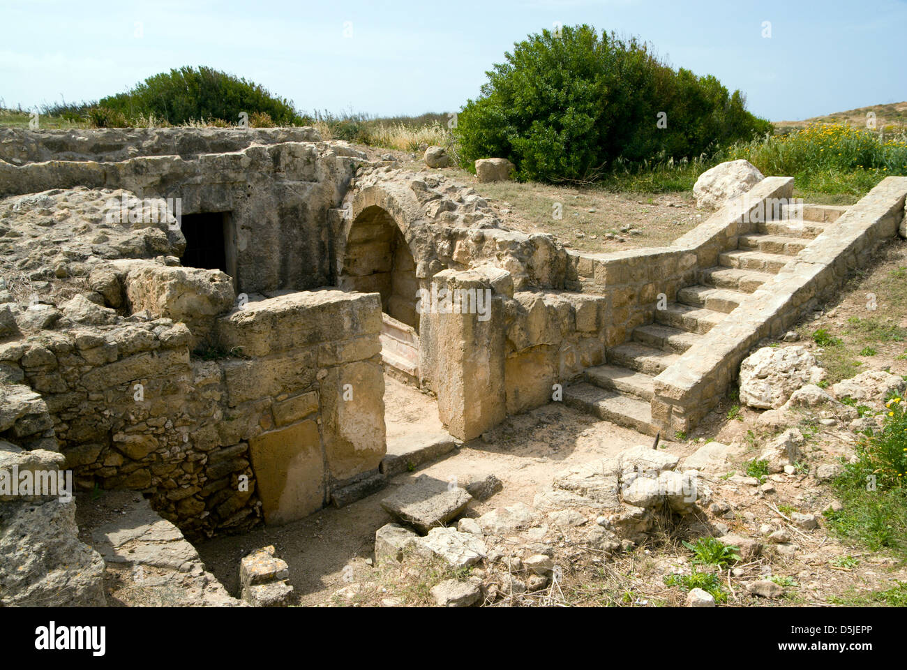 rock carved buildings the garrison camp archaeological park paphos cyprus Stock Photo