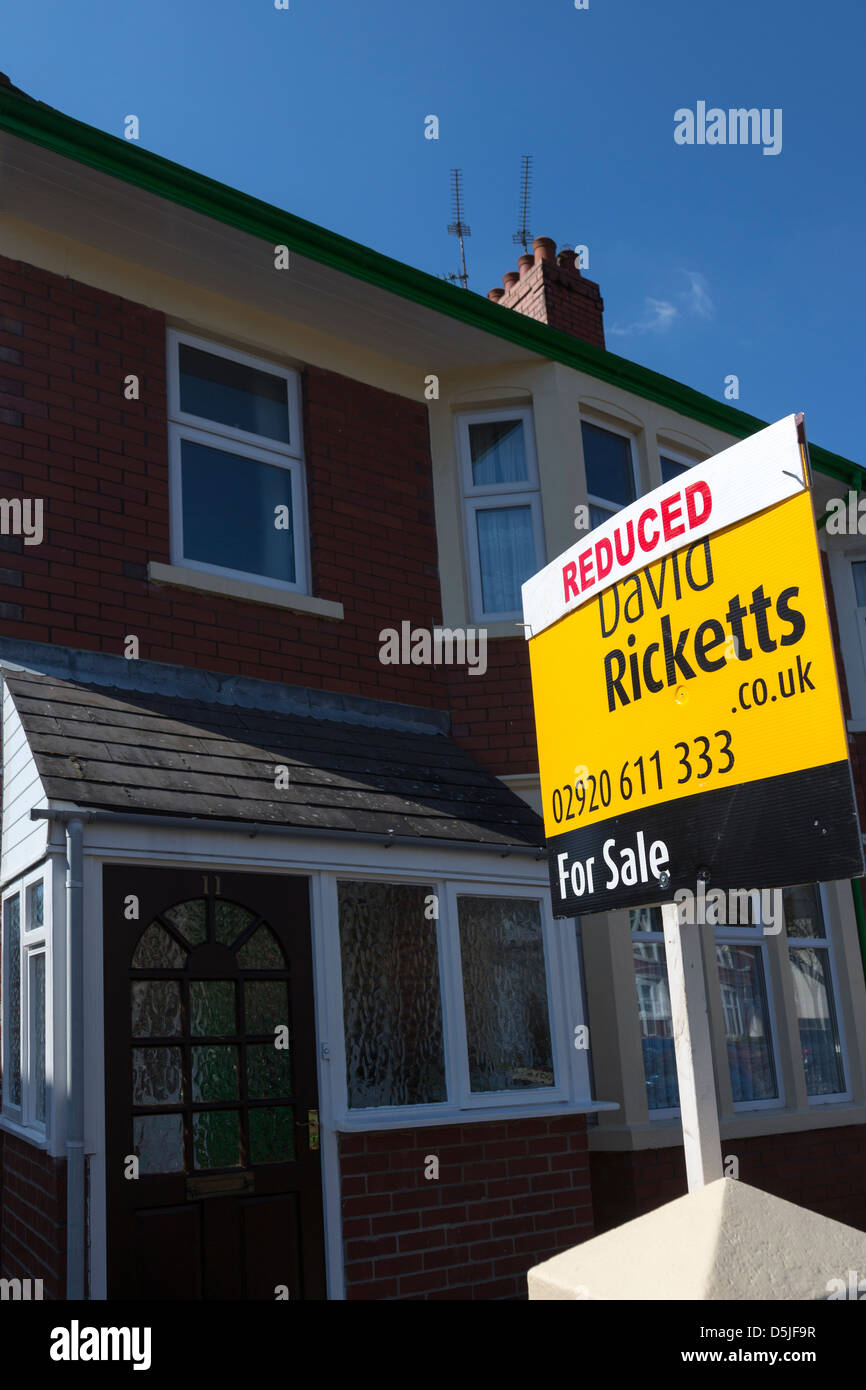 For sale reduced price on estate agent sign for house, Cardiff, Wales
