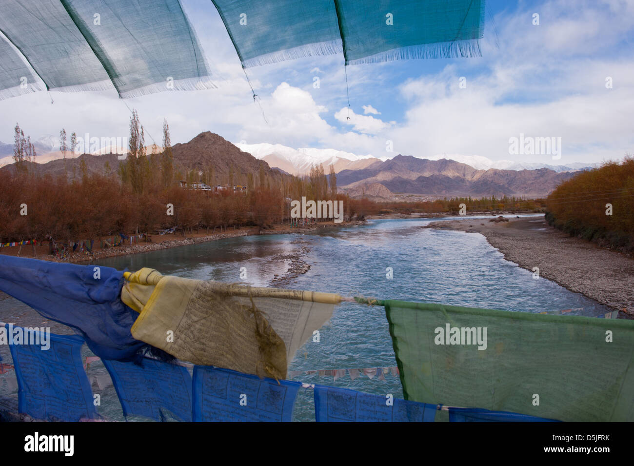 A view of the Indus River with prayer flags at Leh, Ladakh, Jammu and Kashmir. India. Stock Photo