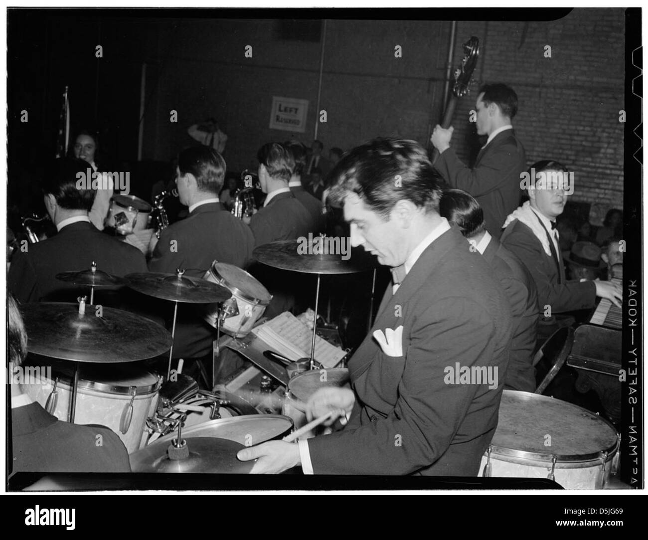 A portrait of Gene Krupa, a famous American drummer, captured in Washington, D.C. between 1938 and 1948. Krupa was a pioneering figure in jazz drumming during the 20th century. Stock Photo