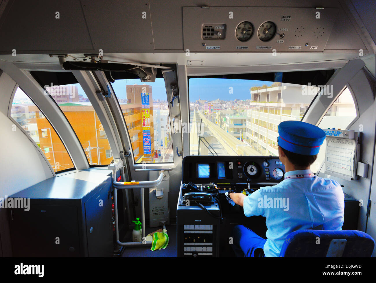 A conductor on the Okinawa Monorail Stock Photo