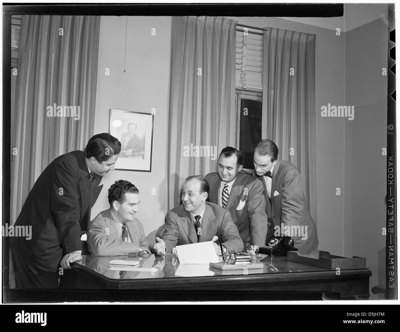 [Portrait of Joe Mooney and Milt Gabler(?), Decca office(?), New York